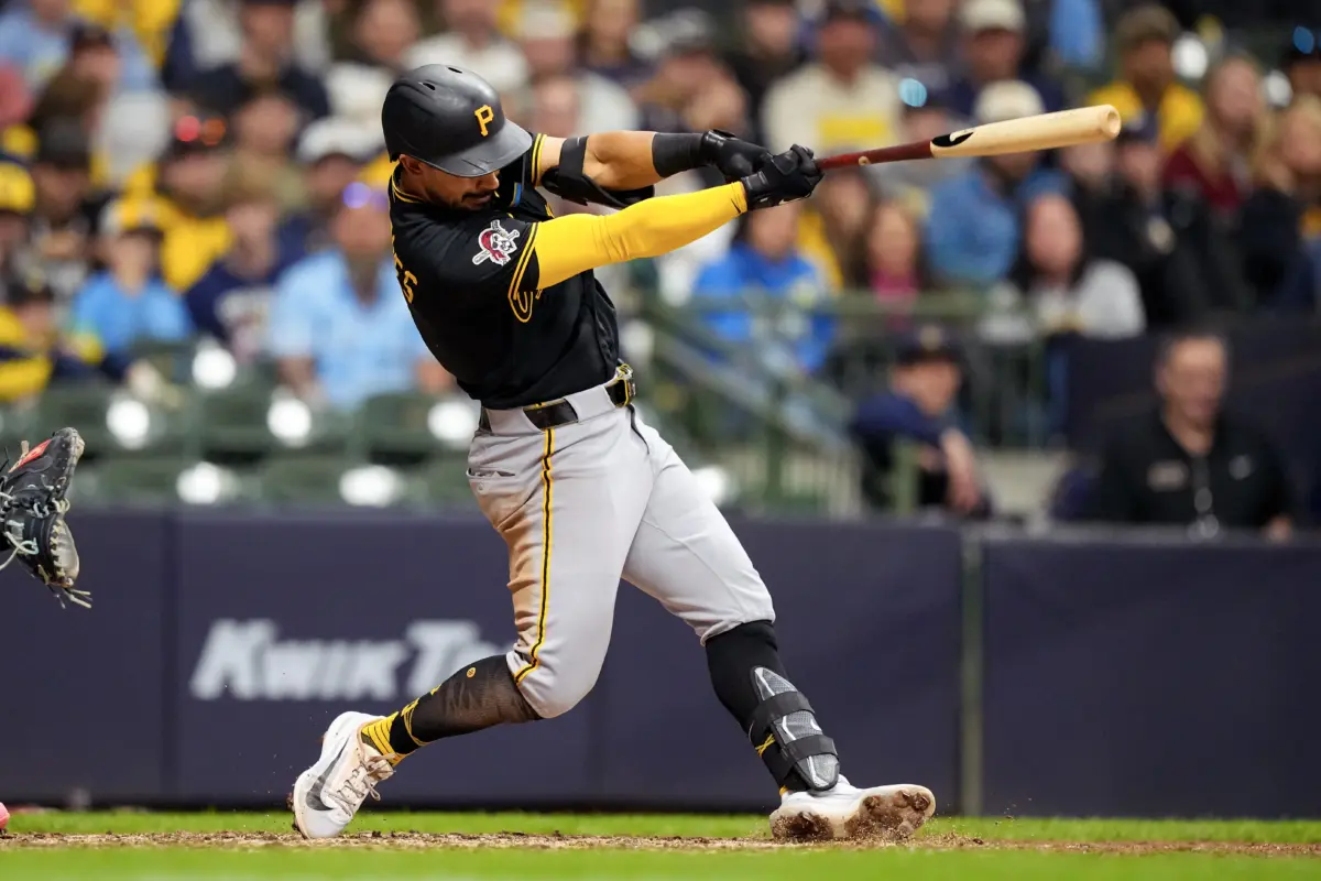 Pittsburgh Pirates third baseman Nick Gonzales (3) hits an RBI single during the tenth inning against the Milwaukee Brewers