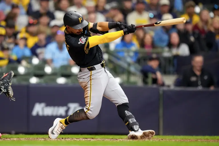 Pittsburgh Pirates third baseman Nick Gonzales (3) hits an RBI single during the tenth inning against the Milwaukee Brewers