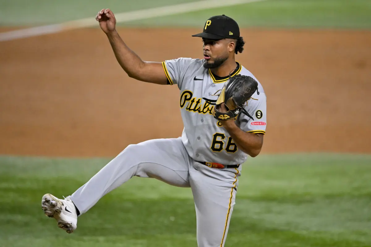 Pittsburgh Pirates relief pitcher Wilber Dotel (66) pitches during the game between the Rangers and the Pirates