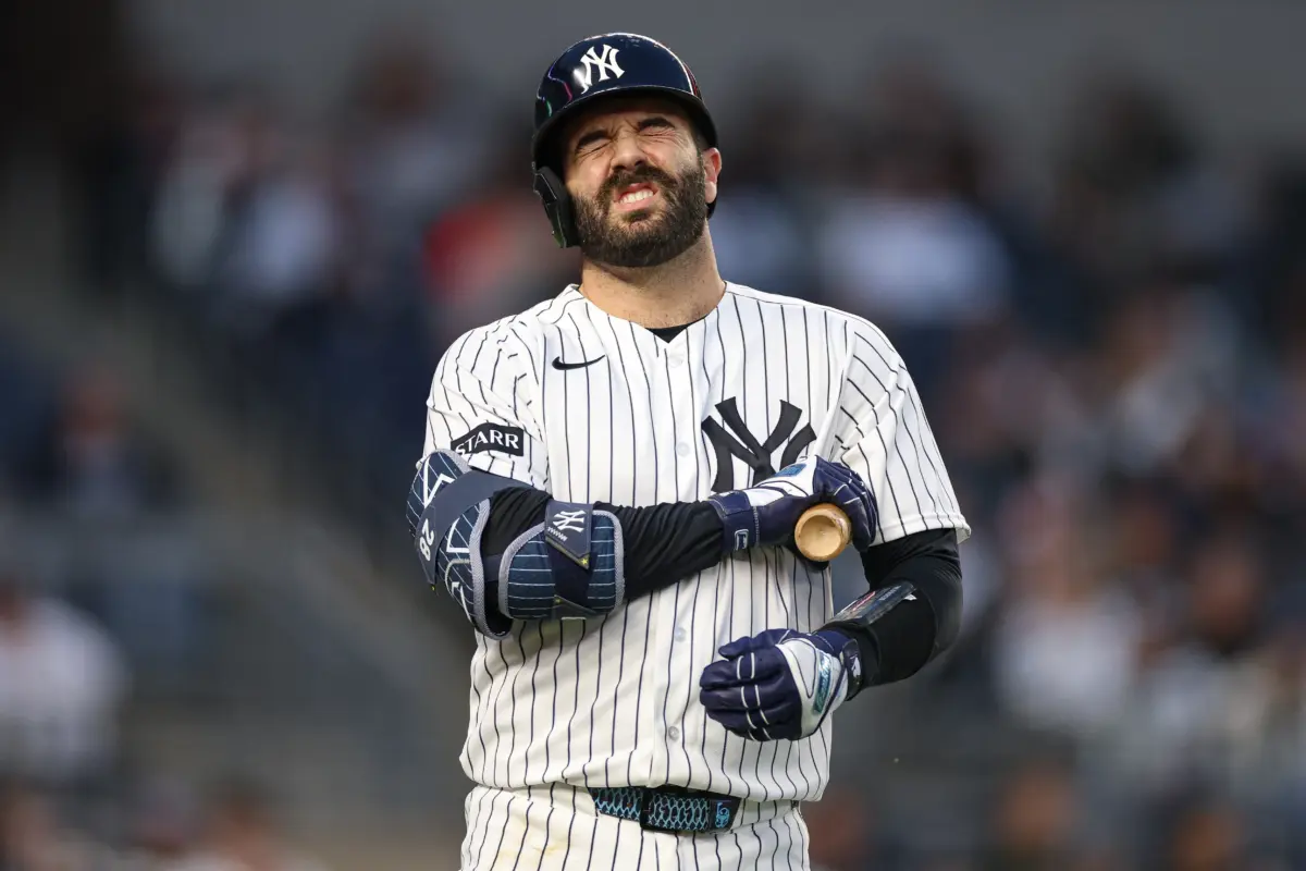 Yankees catcher Austin Wells (28) reacts during an at bat during the second inning against the Baltimore Orioles at Yankee Stadium.