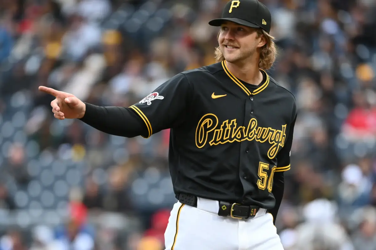 Pittsburgh Pirates starting pitcher Carmen Mlodzinski pointing to center fielder Oneil Cruz after Cruz made an inning-ending catch against the Cincinnati Reds at PNC Park in PIttsburgh, Pennsylvania on May 2, 2026.