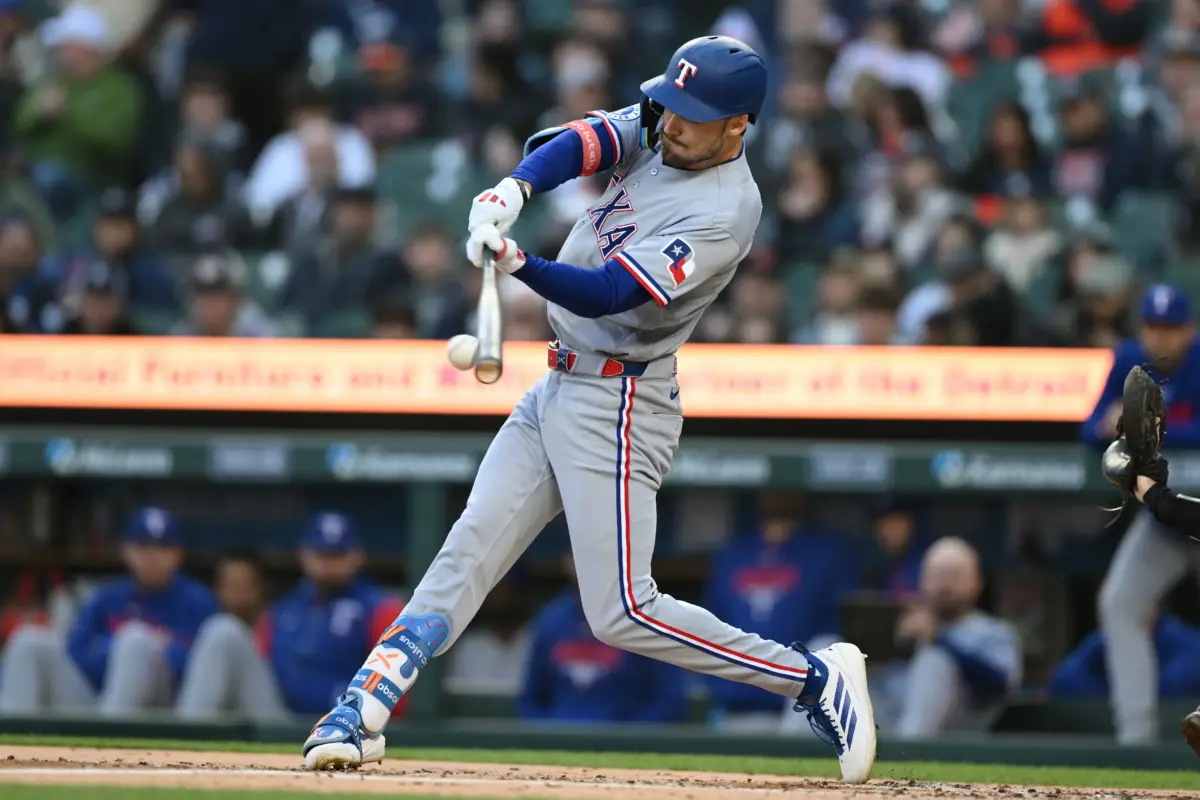 Rangers second baseman Josh Smith (8) grounds out against the Detroit Tigers