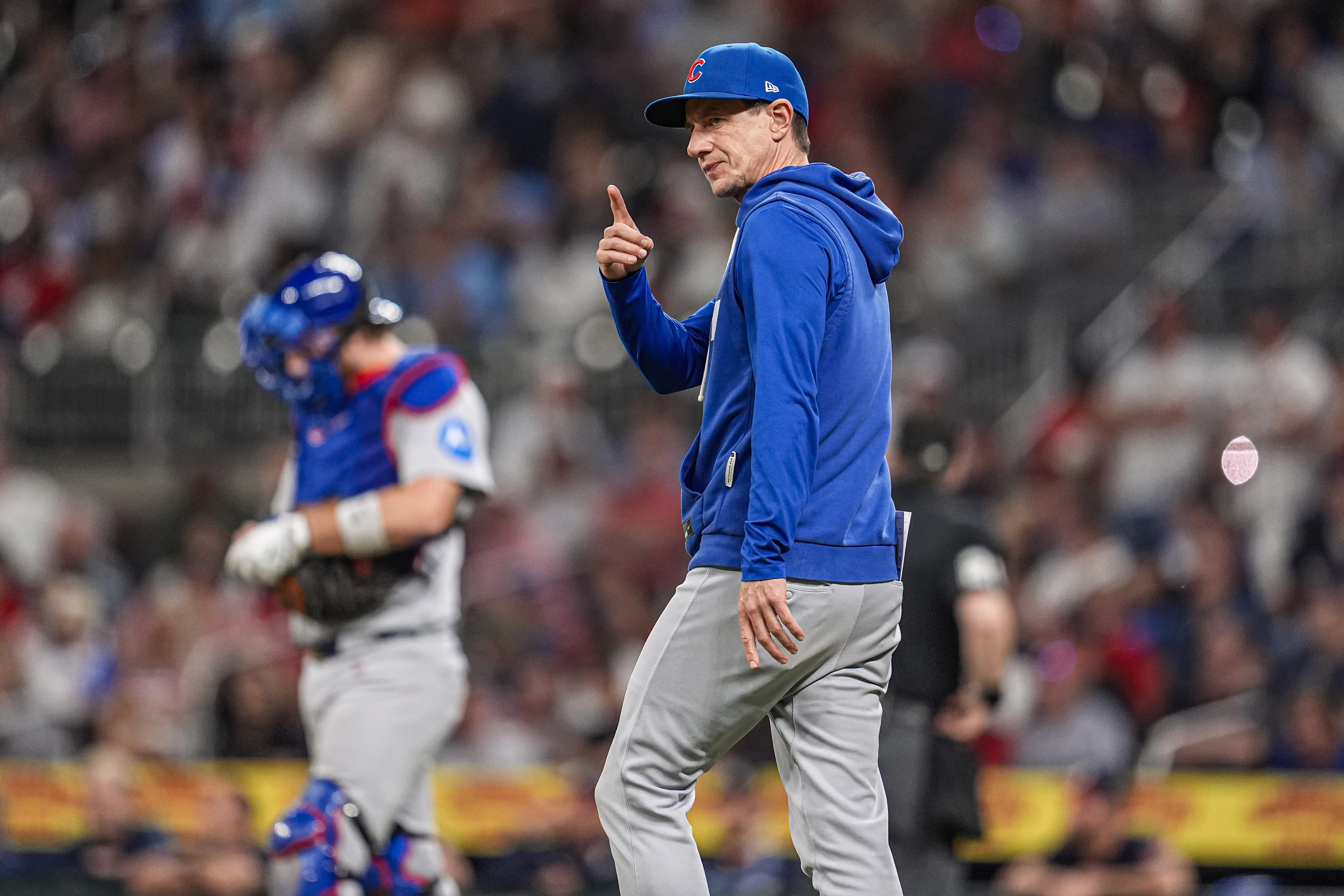 Chicago Cubs manager Craig Counsell walks to the mound to change pitchers vs the Atlanta Braves during the eighth inning at Truist Park in Atlanta, Georgia on May 13, 2026.