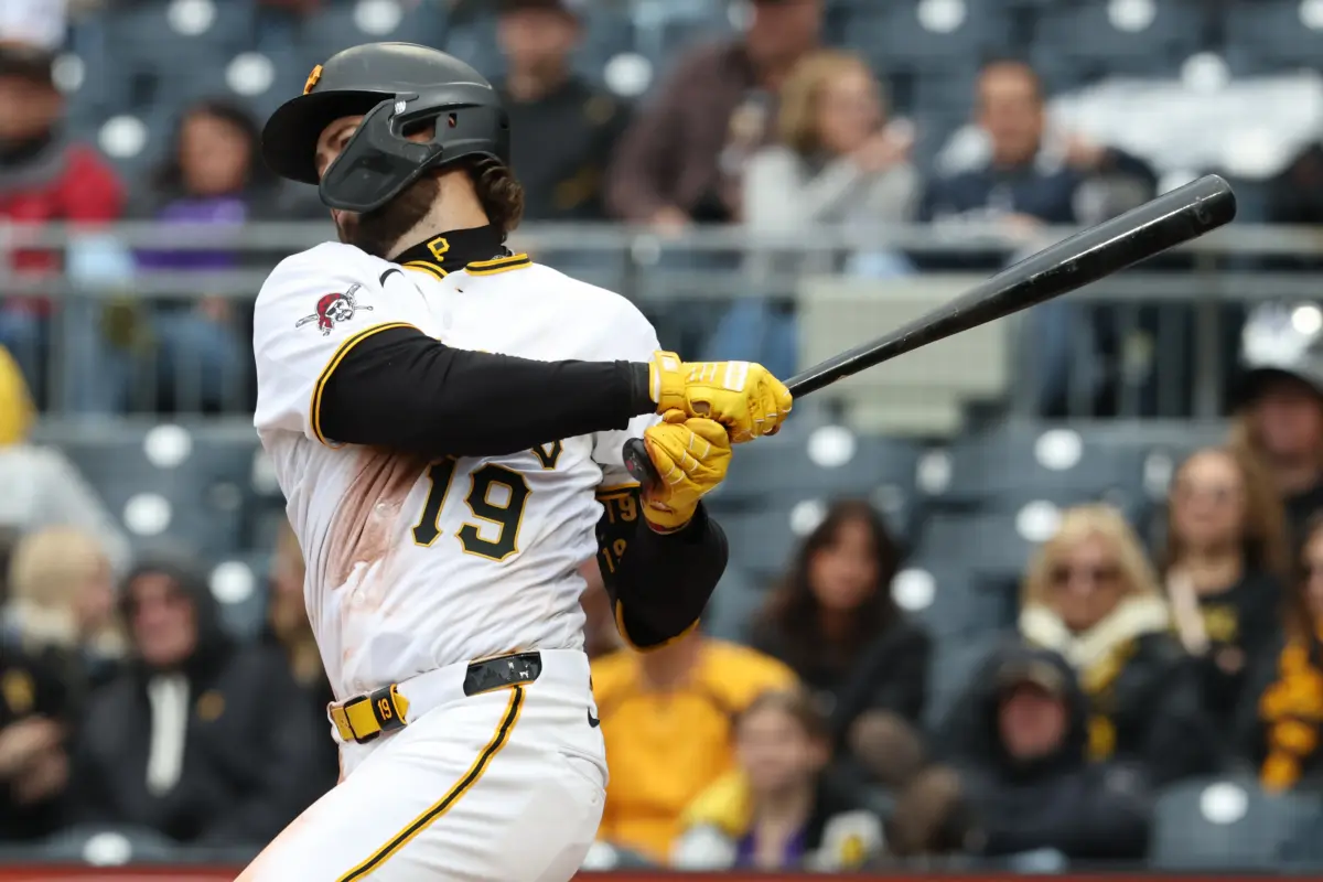 Pittsburgh Pirates third baseman Jared Triolo hitting an RBI single against the Colorado Rockies during the fifth inning at PNC Park in Pittsburgh, Pennsylvania, on May 14, 2026.