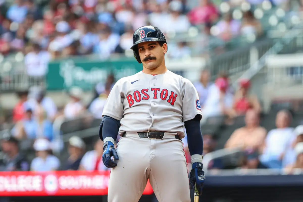Red Sox catcher Mickey Gasper (30) reacts to a strikeout call during the game against the Atlanta Braves during the eighth inning at Truist Park.
