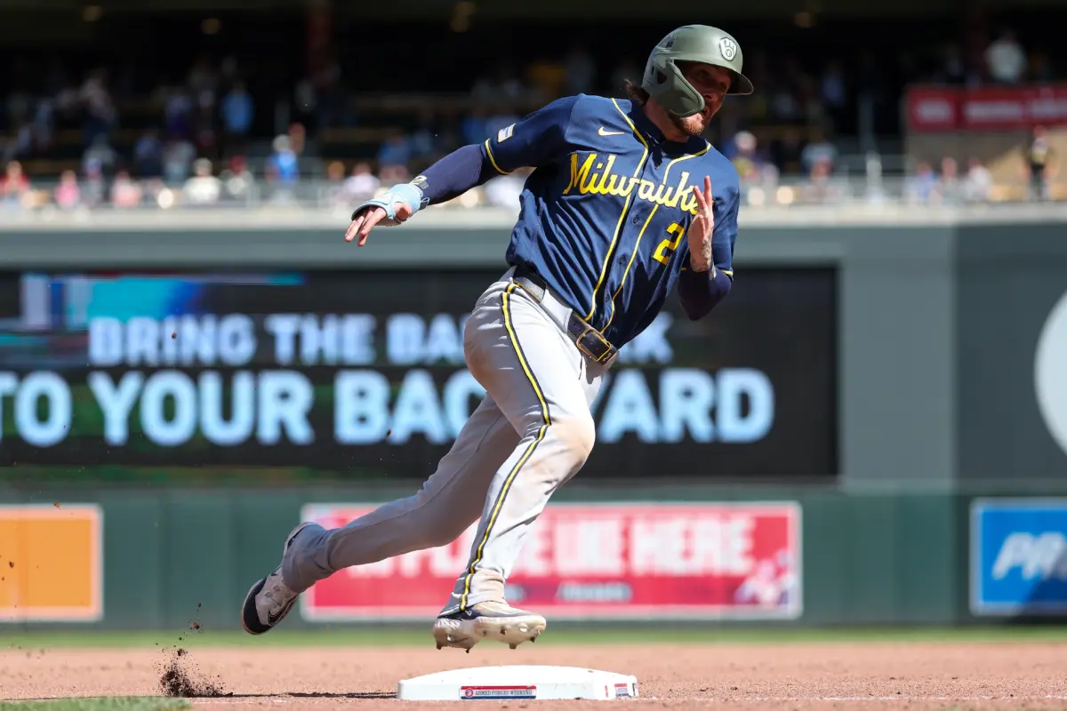 Milwaukee Brewers second baseman Brice Turang rounding third base to score a run vs the Minnesota Twins during the ninth inning at Target Field in Minneapolis, Minnesota on May 17, 2026.