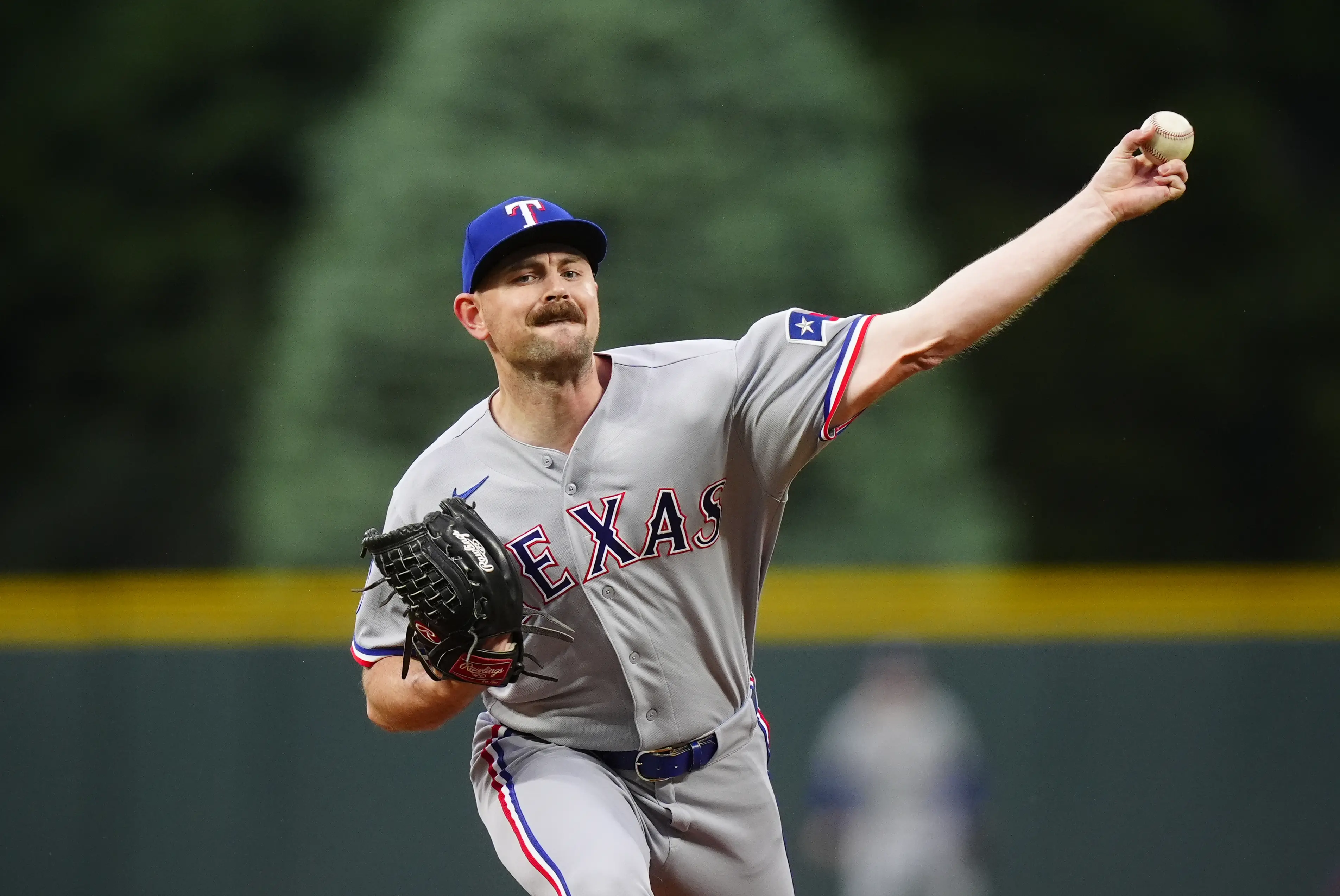 Texas Rangers reliever Tyler Alexander pitching against the Colorado Rockies during the first inning at Coors Field in Denver, Colorado on May 19, 2026.