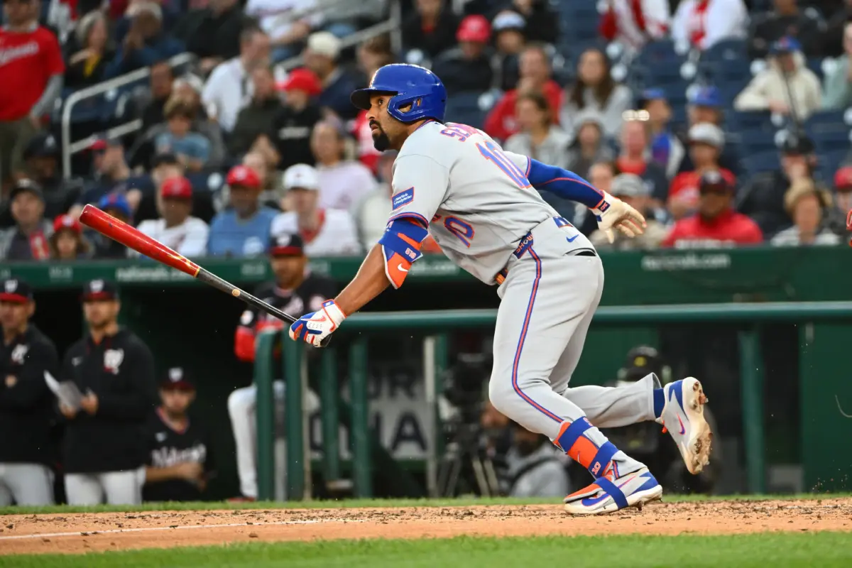 New York Mets second baseman Marcus Semien singles during the ninth inning against the Washington Nationals at Nationals Park in Washington, District of Columbia, on May 21, 2026.