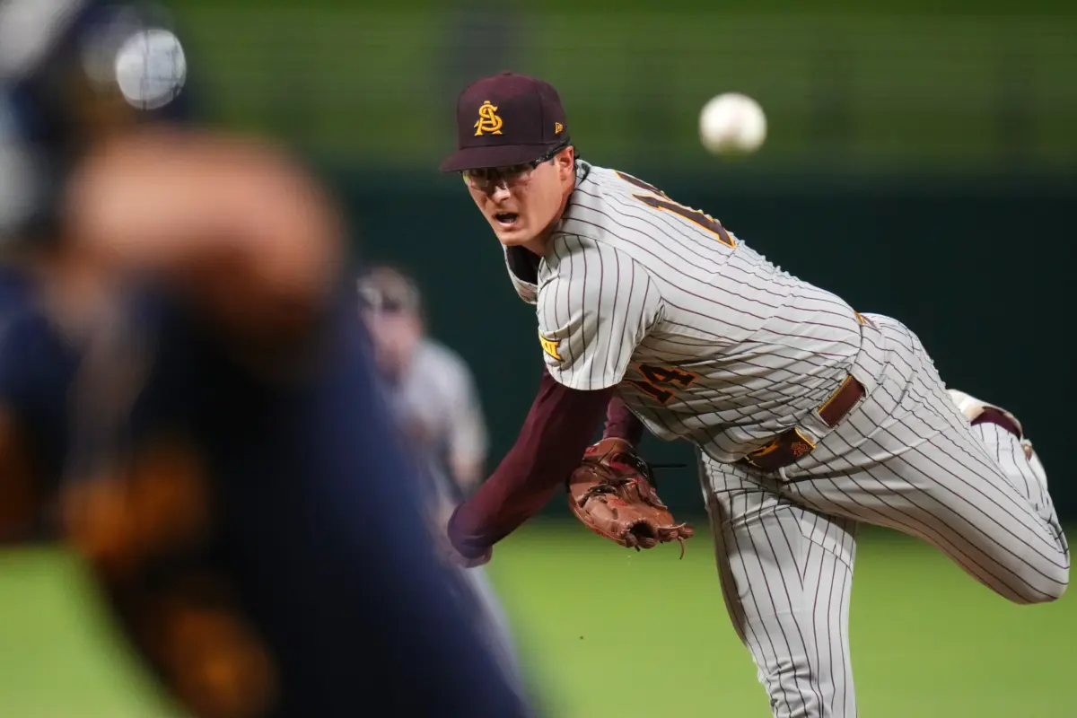 ASU Sun Devils left-hander Cole Carlon pitching against the West Virginia Mountaineers during their Big-12 tournament game at Surprise Stadium on May 22, 2026.