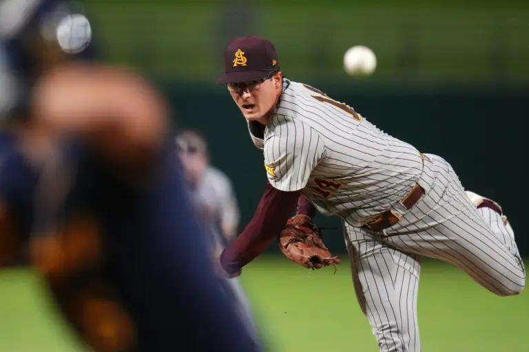 ASU Sun Devils left-hander Cole Carlon pitching against the West Virginia Mountaineers during their Big-12 tournament game at Surprise Stadium on May 22, 2026.