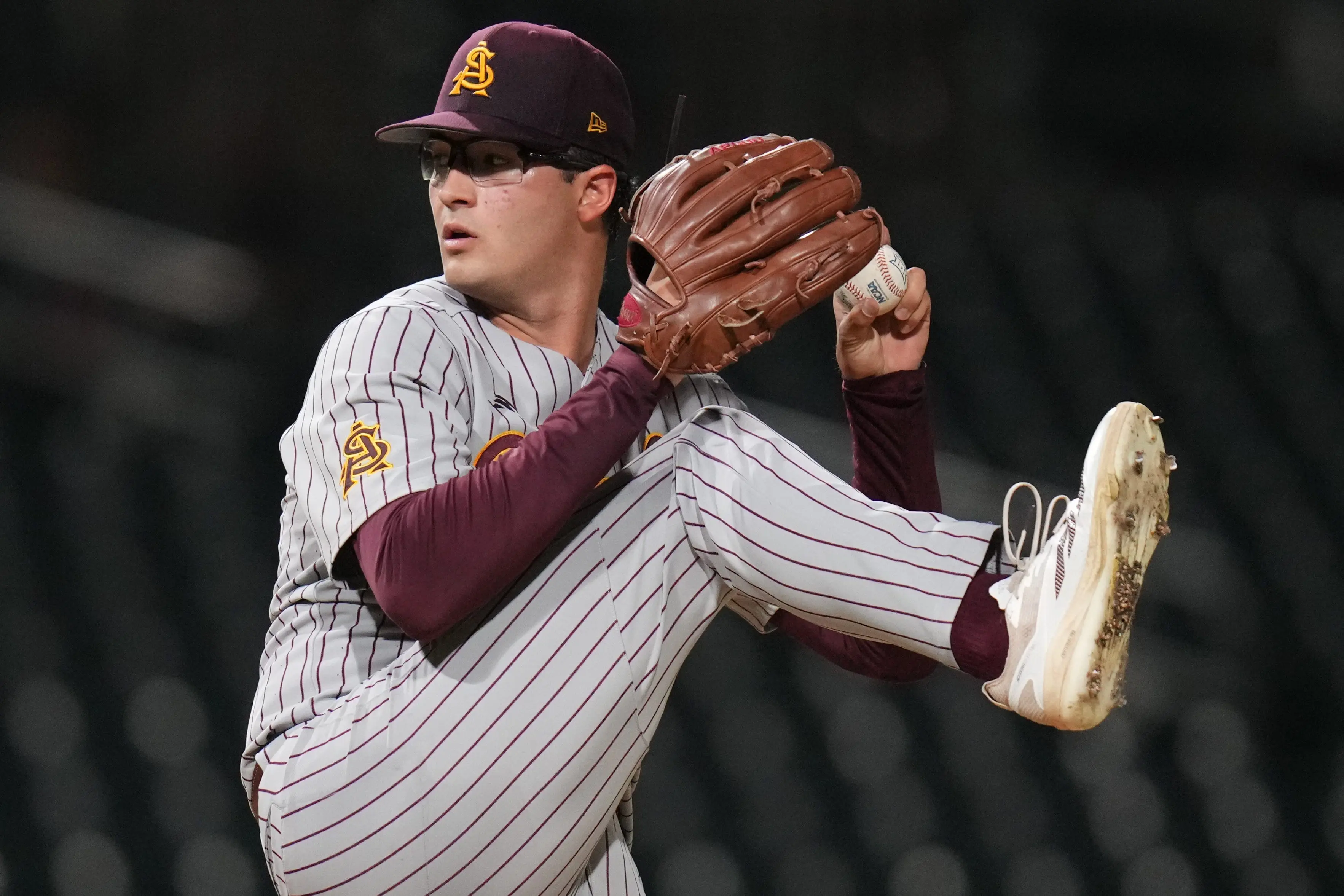 Arizona State Sun Devils left-hander Cole Carlon pitching against the West Virginia Mountaineers during their Big-12 tournament game at Surprise Stadium on May 22, 2026.