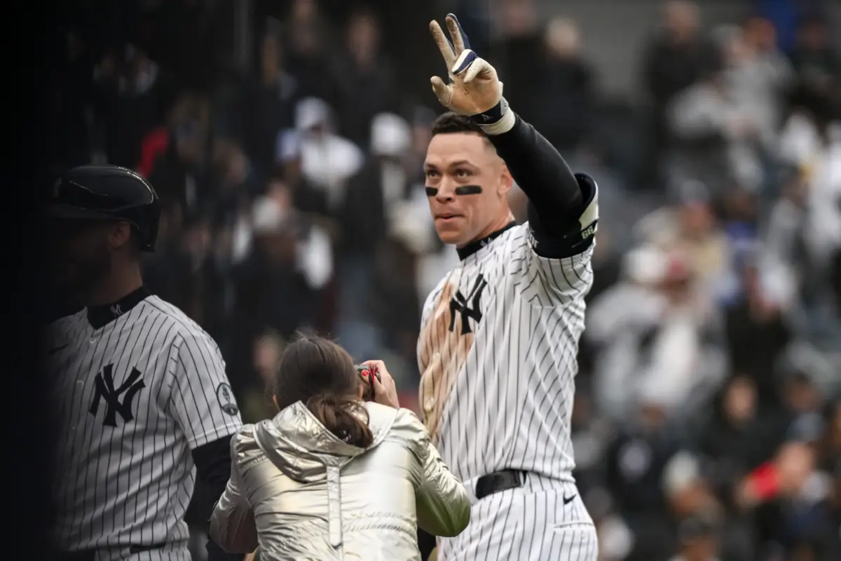 New York Yankees right fielder Aaron Judge throws up a peace sign to the crowd following a two-run walk off home run vs the Tampa Bay Rays at Yankee Stadium in Bronx, New York on May 24, 2026.