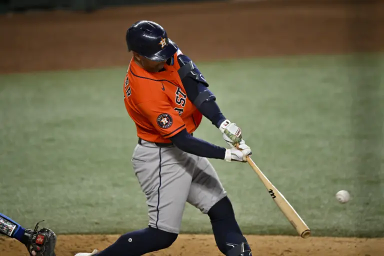 Houston Astros first baseman Christian Walker hits a three run home run during the seventh inning against the Texas Rangers at Globe Life Field in Arlington, Texas, on May 25, 2026.