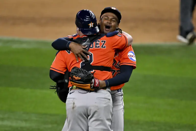 Pitcher Alimber Santa (72) and catcher Christian Vazquez (2) celebrates a combined Astros no-hitter.