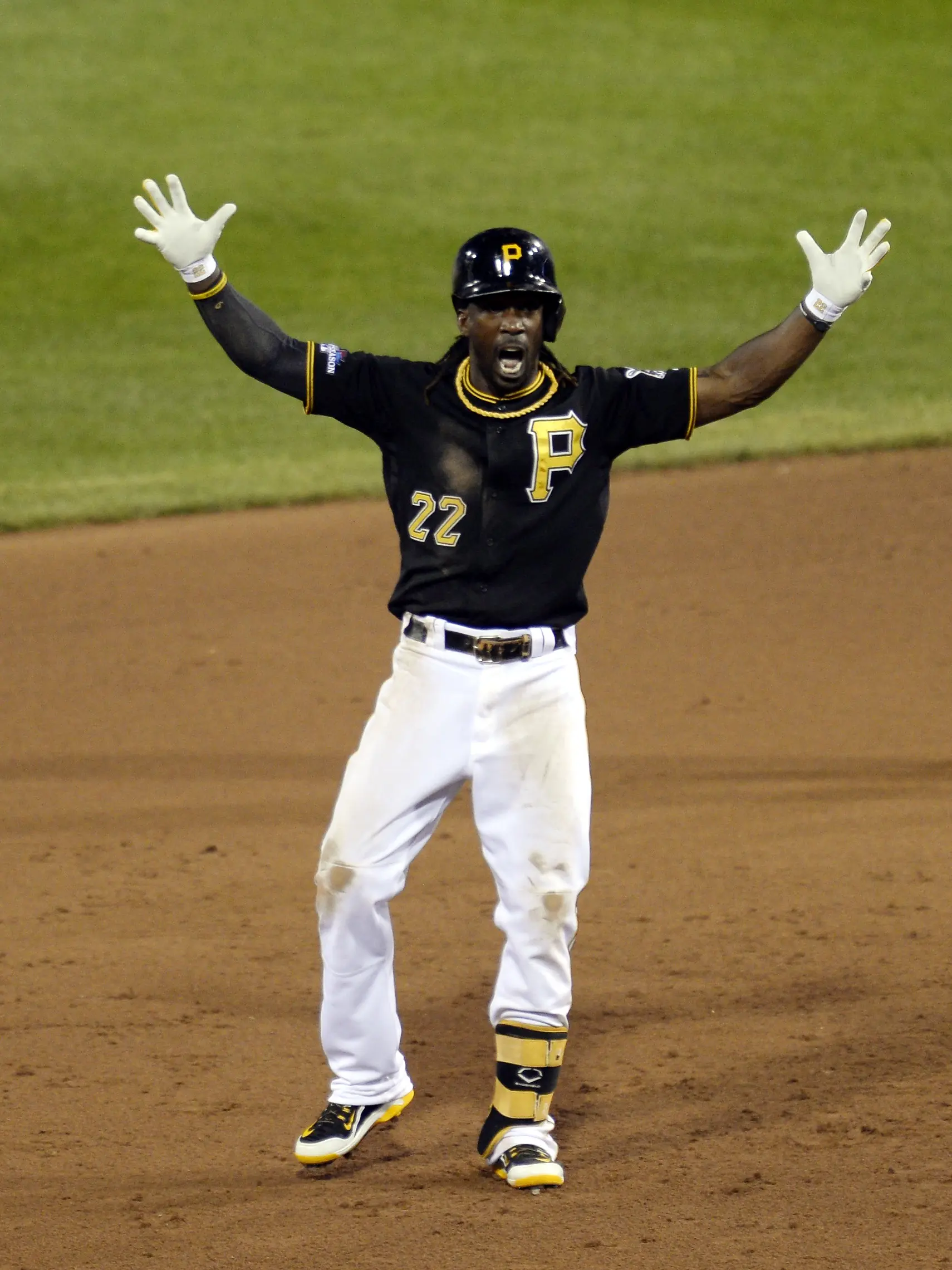 Pittsburgh Pirates center fielder Andrew McCutchen reacts after hitting a double against the St. Louis Cardinals in game three of the NLDS at PNC Park in Pittsburgh Pennsylvania on October 6, 2013.