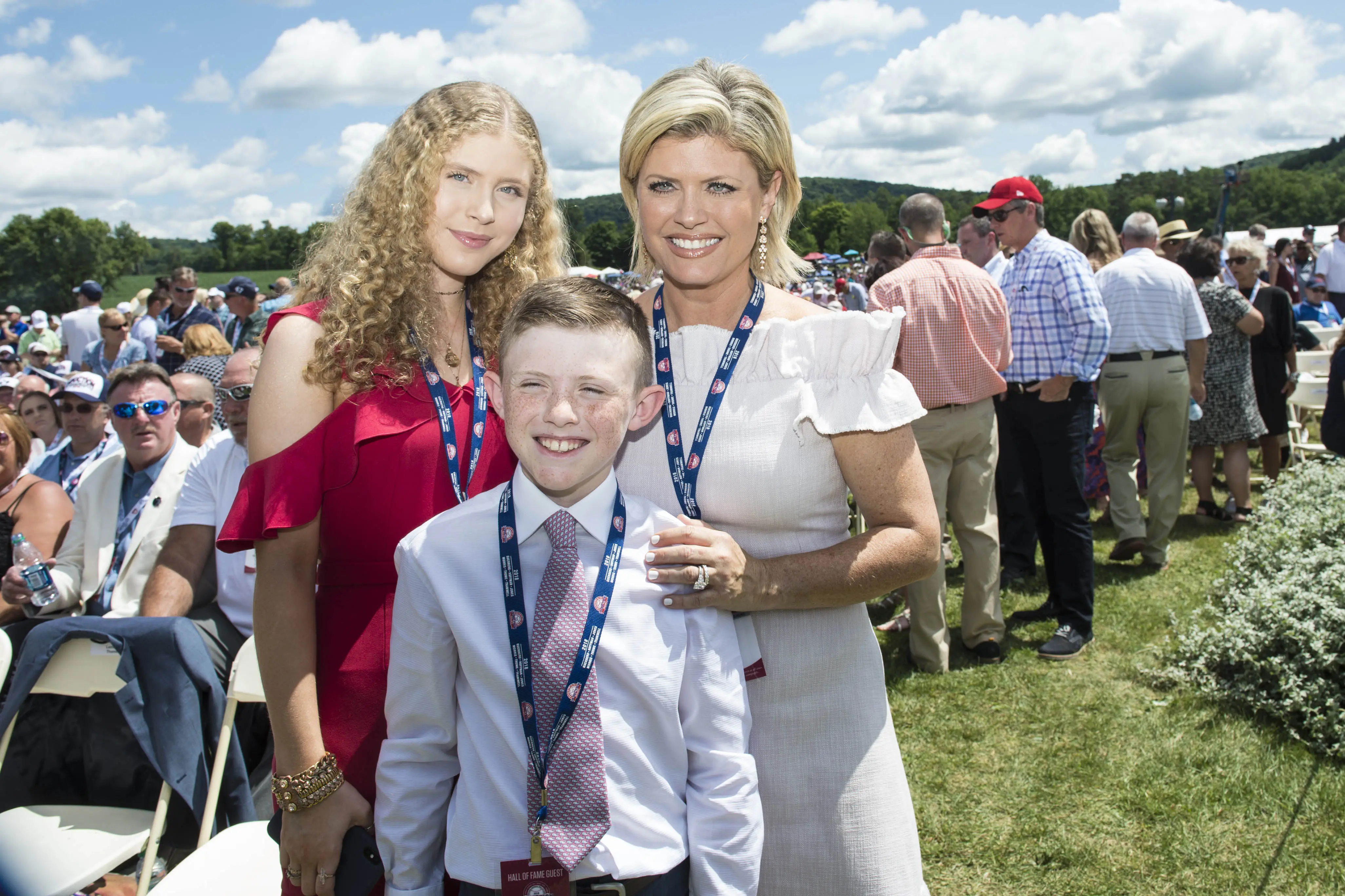 Landon with his sister, Lila, and mother, Andea, at Jim's Hall of Fame Induction Ceremony in 2018. Eight years later, Landon has a draft day decision to make.