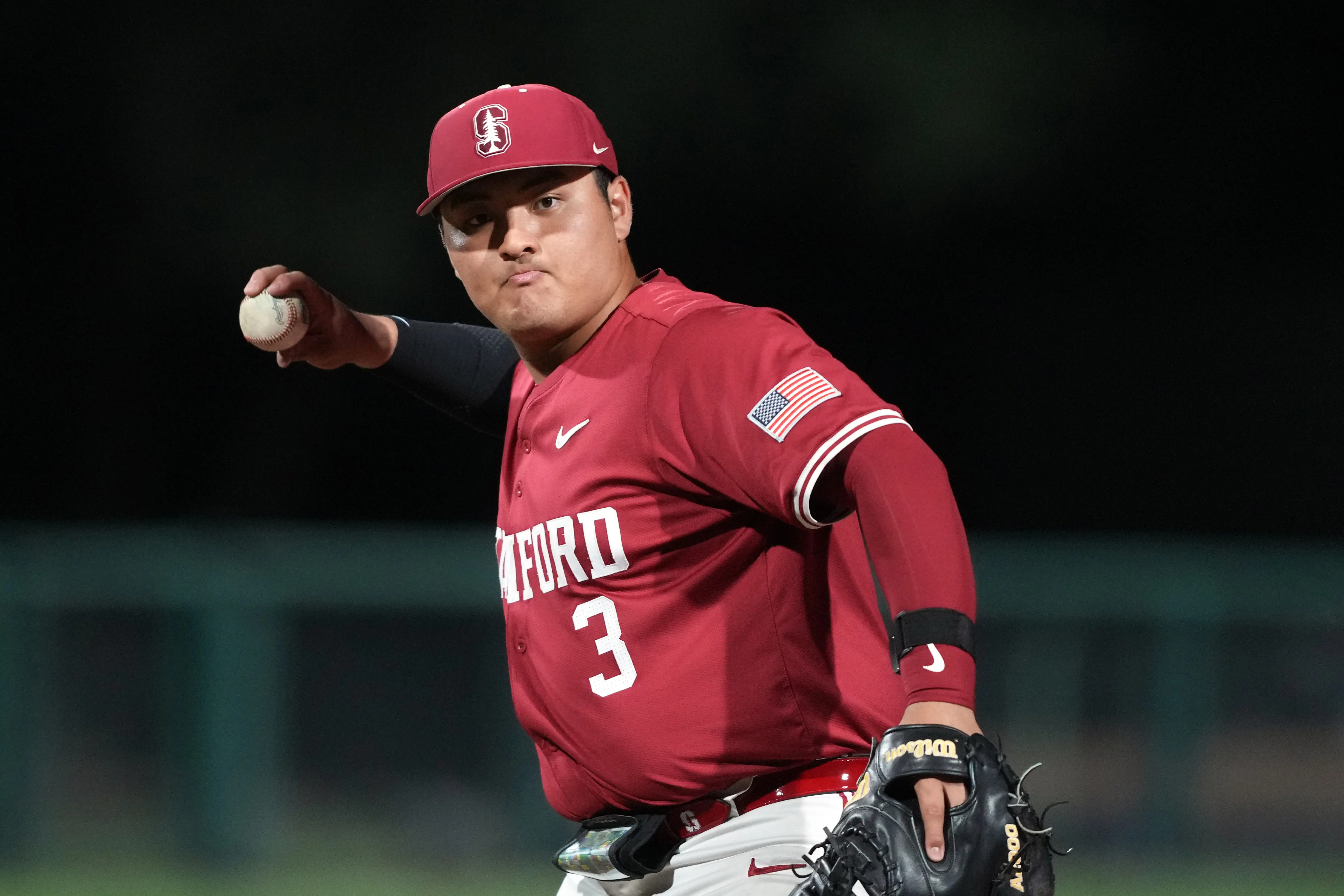 Stanford Cardinal first baseman Rintaro Sasaki (3) throws during the eighth inning against the Xavier Musketeers at Sunken Diamond