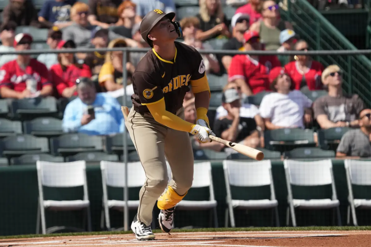 Padres prospect Jase Bowen (45) hits against the Los Angeles Angels in spring training at Tempe Diablo Stadium.