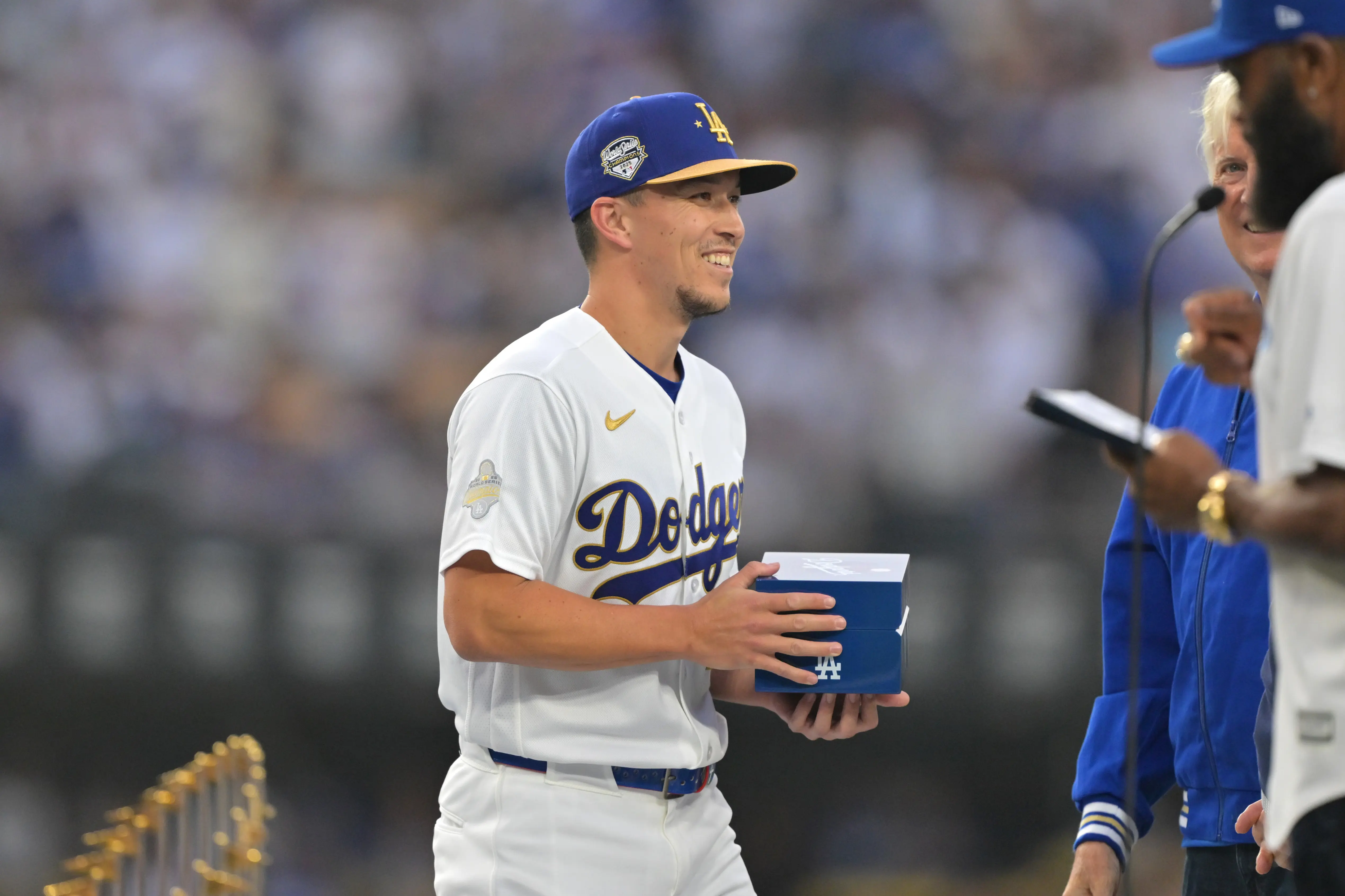 Los Angeles Dodgers second baseman Tommy Edman receives his ring during the World Series ring ceremony before a game vs the Arizona Diamondbacks at Dodger Stadium in Los Angeles, California on March 27, 2026.