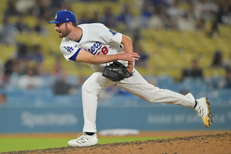 Dodgers relief pitcher Wyatt Mills (58) delivers a pitch against the San Francisco Giants at Dodger Stadium.