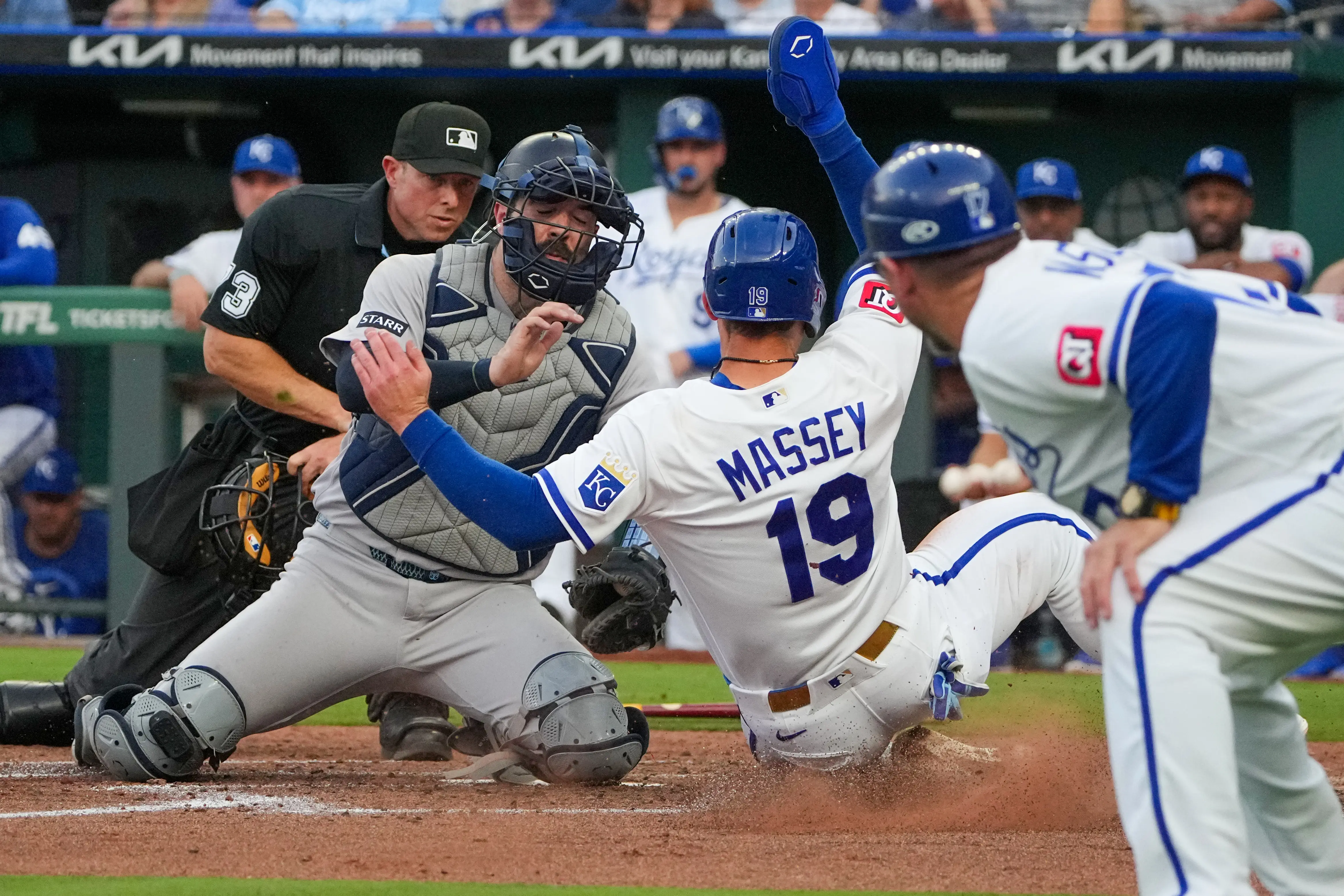 New York Yankees catcher Austin Wells tagging out Kansas City Royals second baseman Michael Massey at home during the third inning at Kauffman Stadium in Kansas City, Missouri, on May 27, 2026.