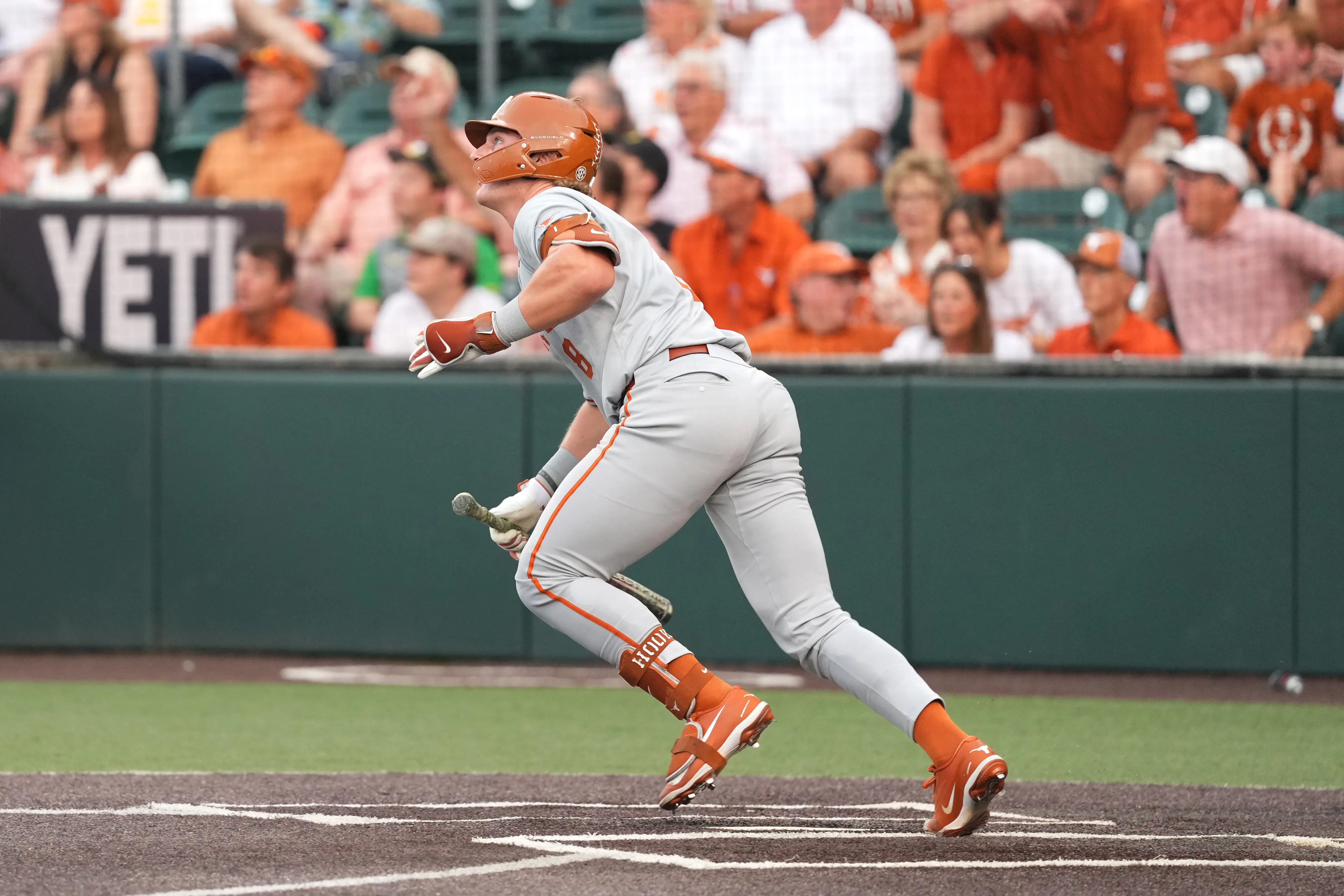 Longhorns catcher Carson Tinney (8) hits a homerun during the first inning of a Super Regional game against the Oregon Ducks