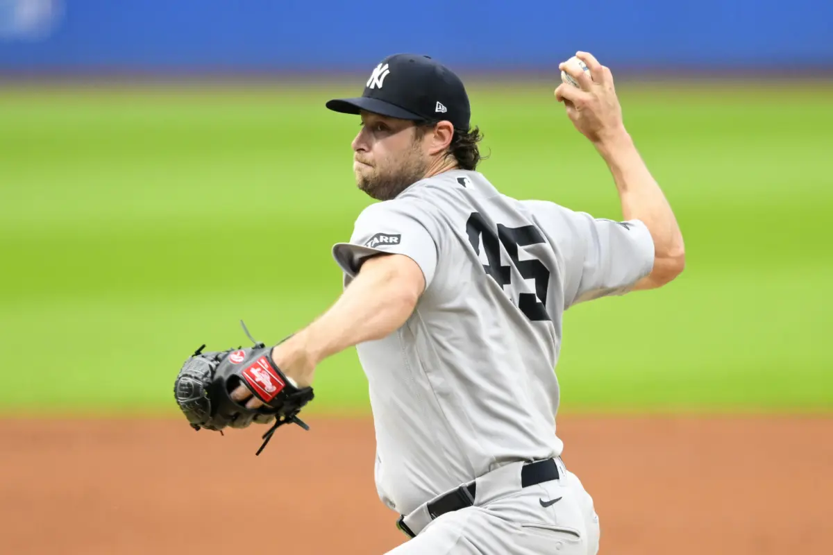 Yankees starting pitcher Gerrit Cole (45) delivers a pitch in the first inning against the Cleveland Guardians at Progressive Field.