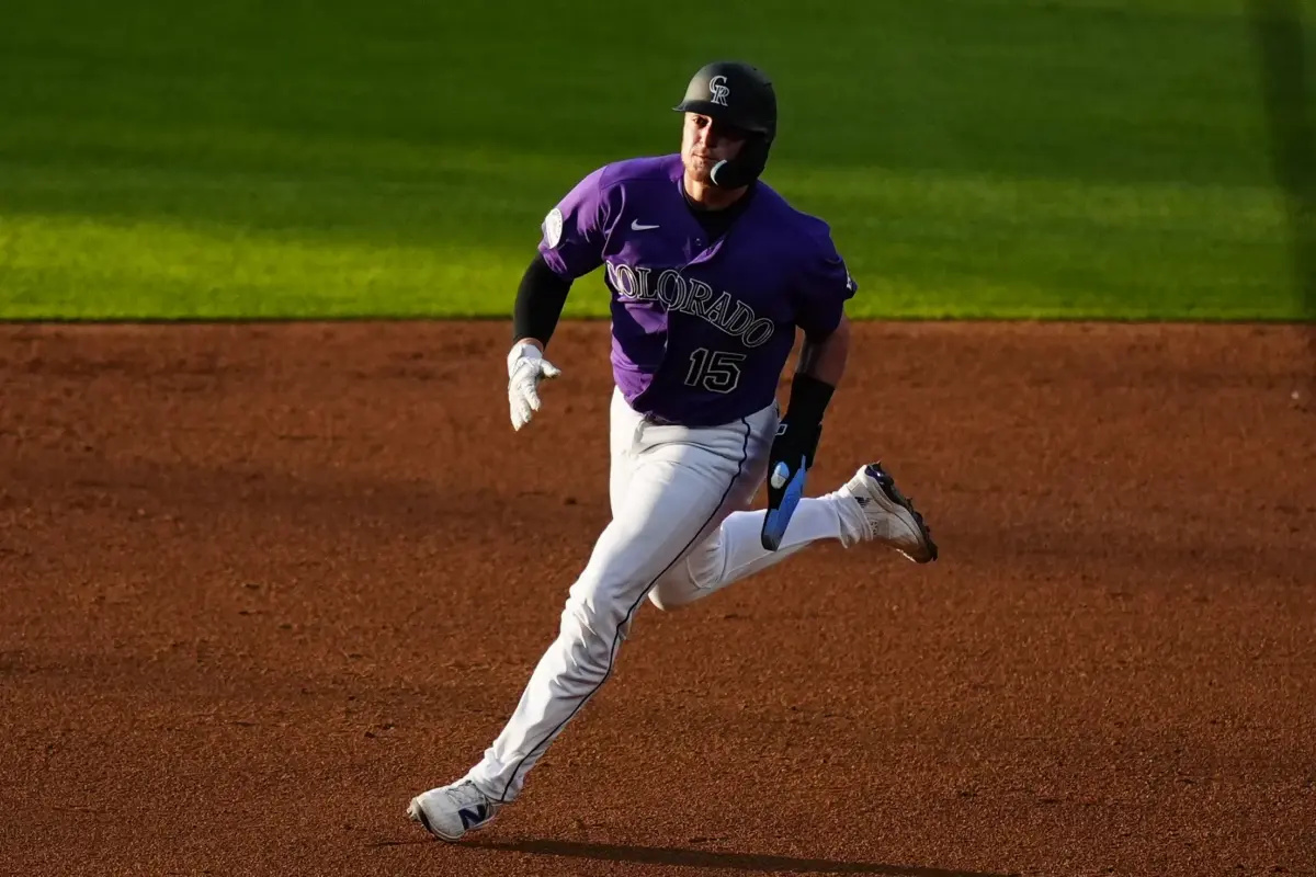 Colorado Rockies catcher Hunter Goodman heads home to score a run in the third inning against the Chicago Cubs at Coors Field in Denver, Colorado on June 9, 2026.