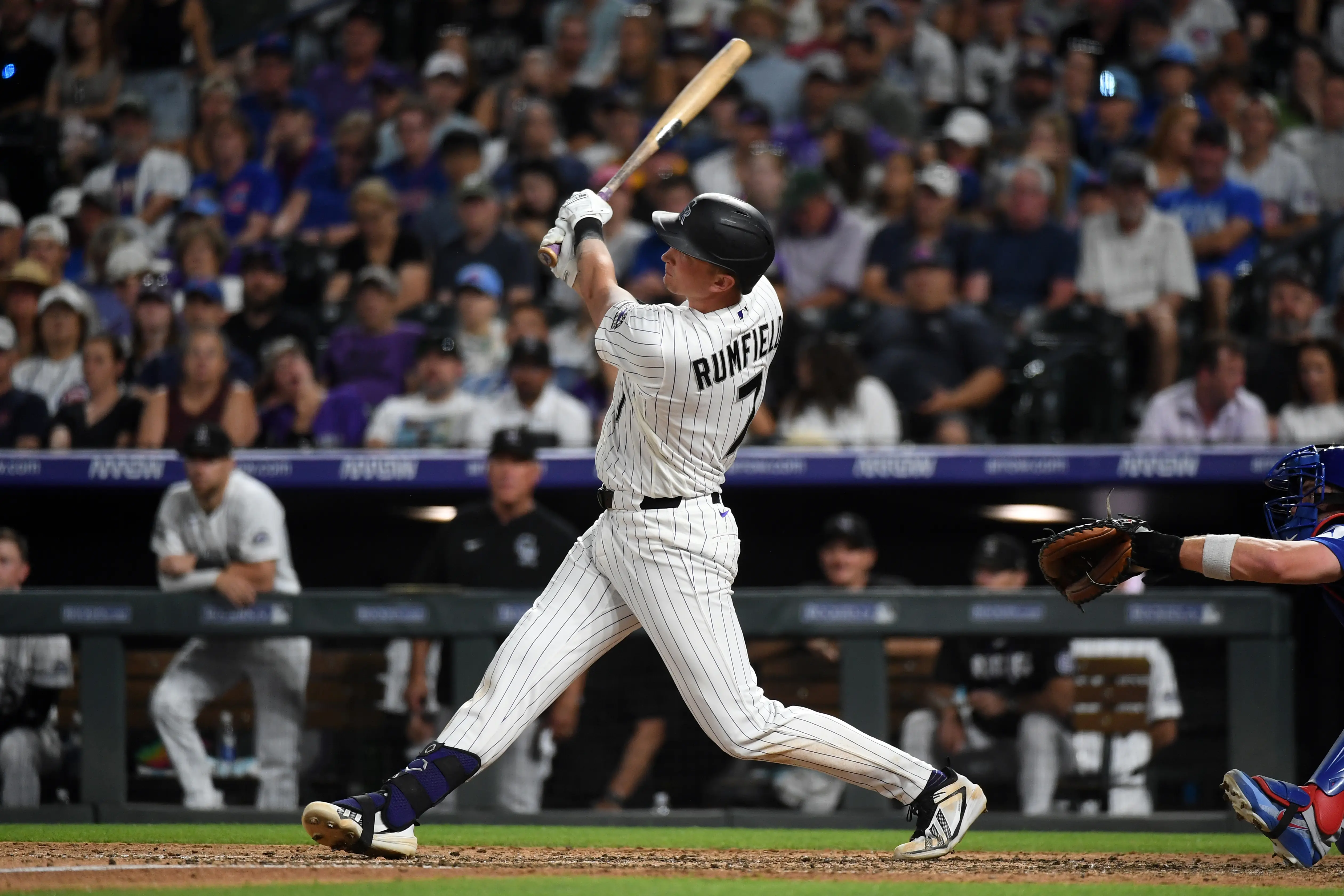 Colorado Rockies first baseman TJ Rumfield hitting a go-ahead two-run home run vs the Chicago Cubs at Coors Field in Denver, Colorado on June 10, 2026.