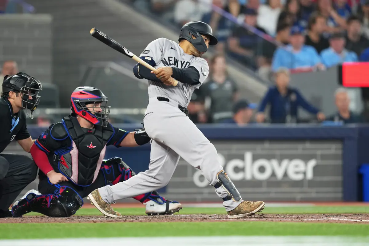 Yankees center fielder Trent Grisham (12) hits an RBI double against the Toronto Blue Jays during the sixth inning at Rogers Centre.