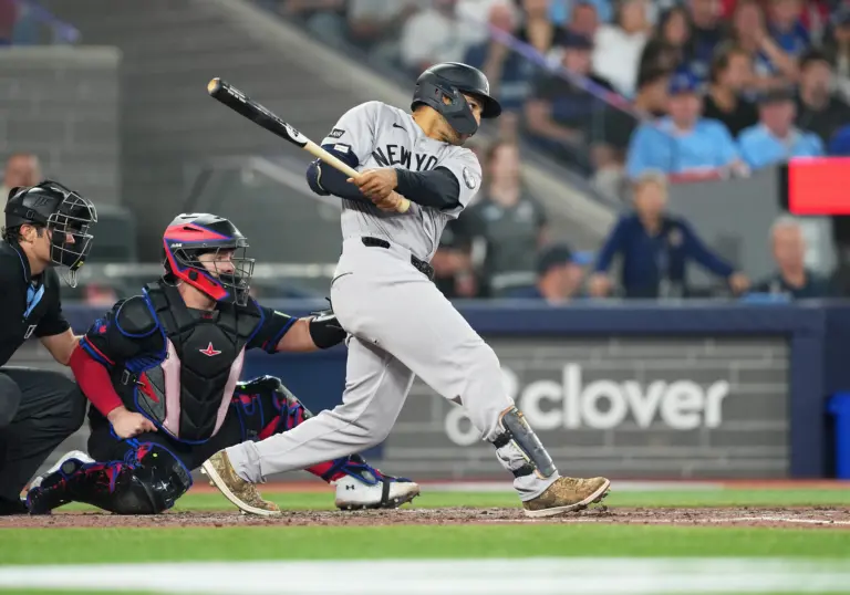 Yankees center fielder Trent Grisham (12) hits an RBI double against the Toronto Blue Jays during the sixth inning at Rogers Centre.