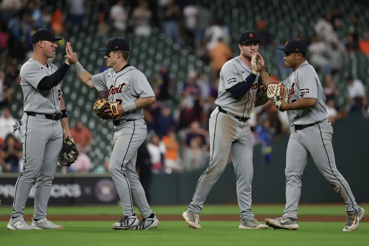 Tigers first baseman Spencer Torkelson (20) high fives shortstop Kevin McGonigle (7) while third baseman Colt Keith (33) high fives Hao-Yu Lee after defeating the Houston Astros at Daikin Park.