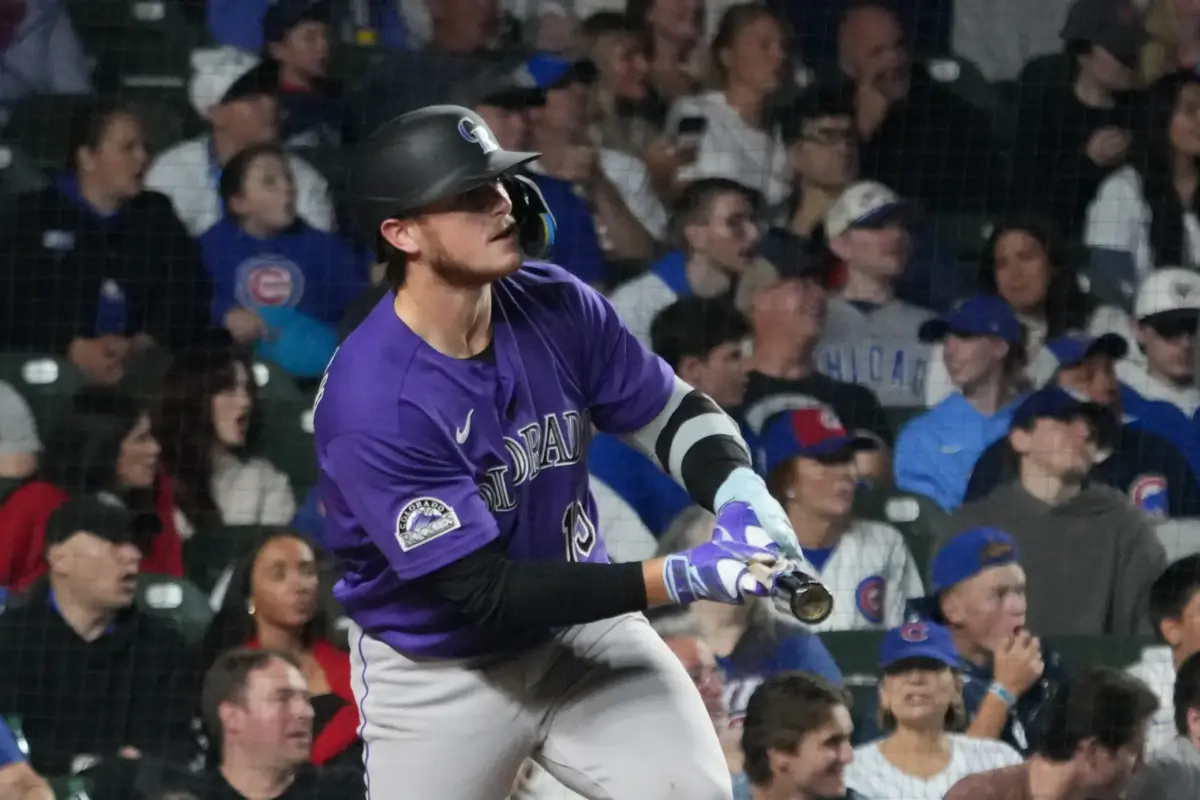 Colorado Rockies catcher Hunter Goodman hits a two-run home run vs the Chicago Cubs during the eighth inning at Wrigley Field in Chicago, Illinois on June 17, 2026.