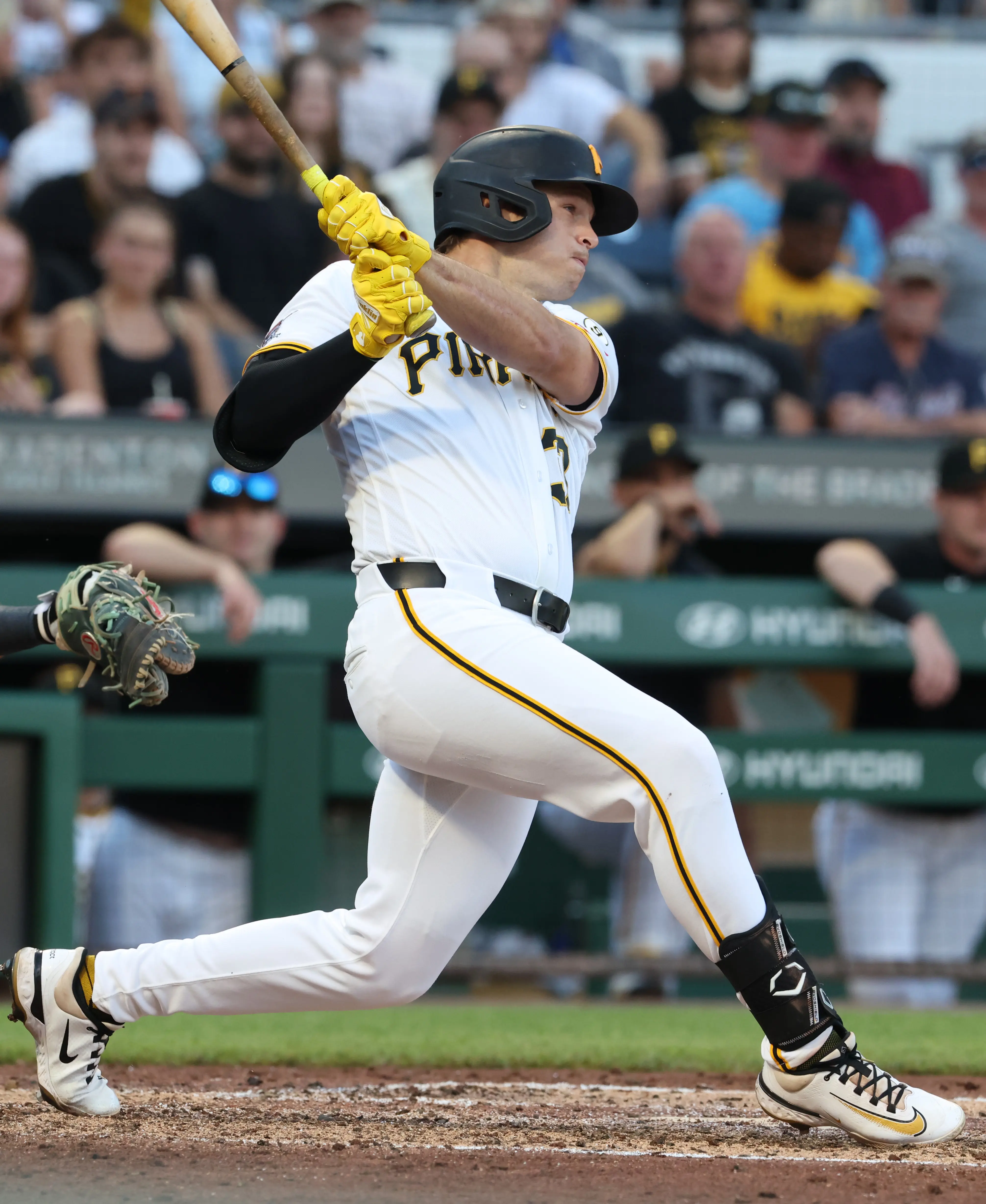Pittsburgh Pirates right fielder Tyler Callihan hits an RBI triple vs the Seattle Mariners during the fourth inning at PNC Park in Pittsburgh, Pennsylvania on June 24, 2026.