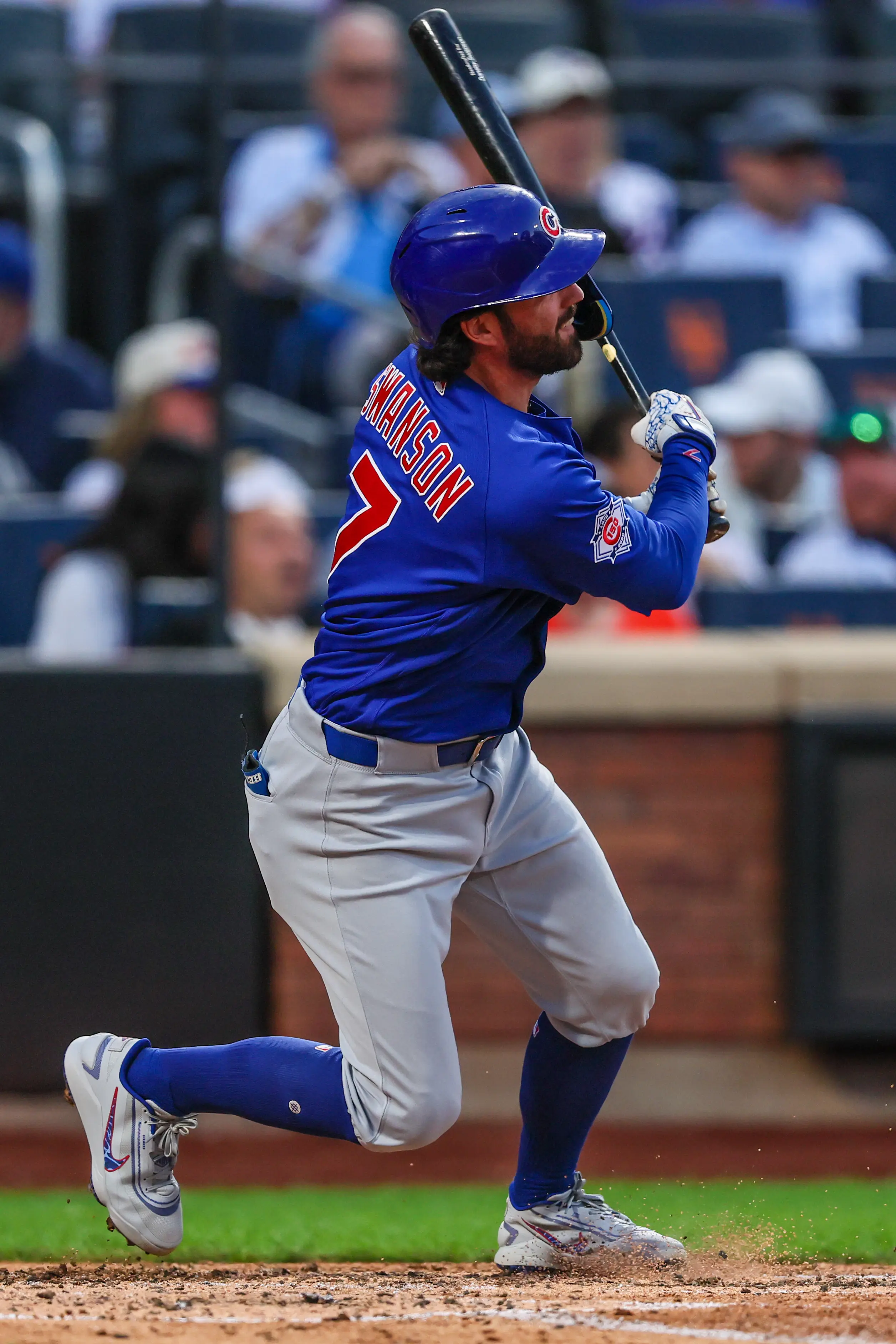 Chicago Cubs shortstop Dansby Swanson hits an RBI single during the fourth inning against the New York Mets at Citi Field in Queens, New York on June 24, 2026.