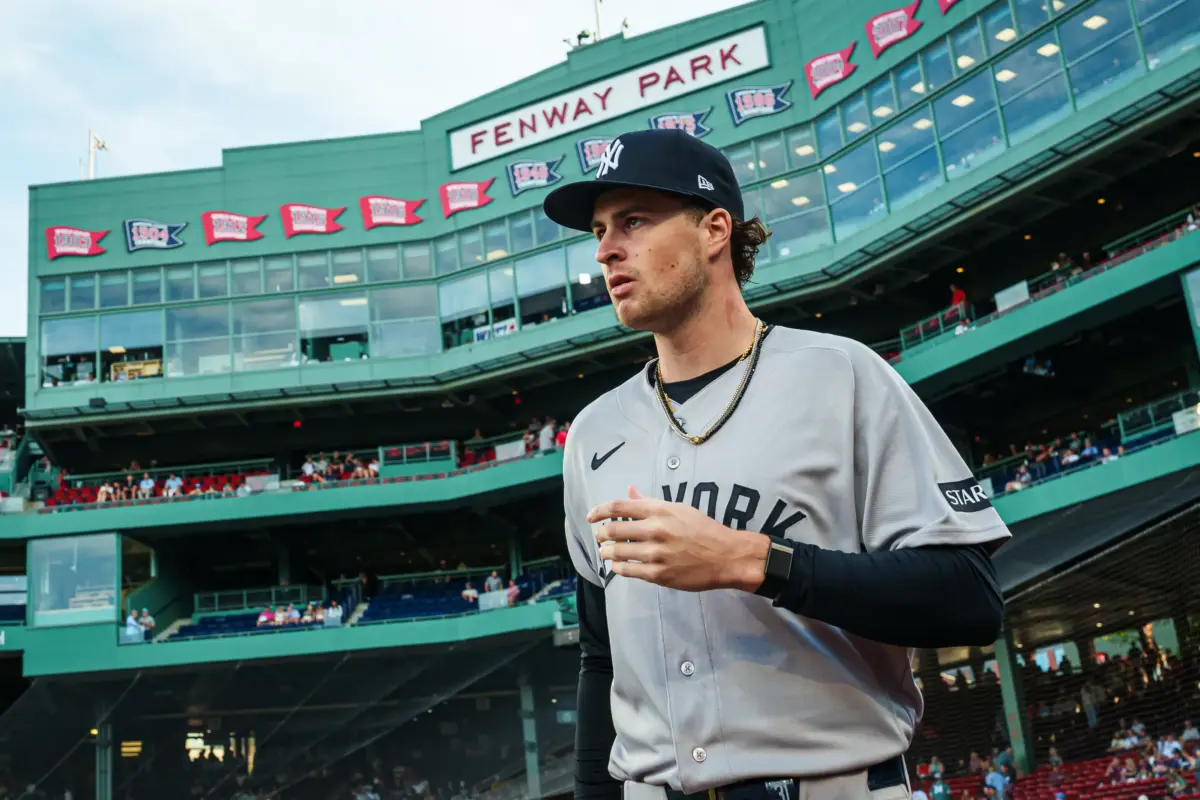 New York Yankees starting pitcher Cam Schlittler walking to the bullpen before the start of the game vs the Boston Red Sox at Fenway Park in Boston, Massachusetts on June 25, 2026.
