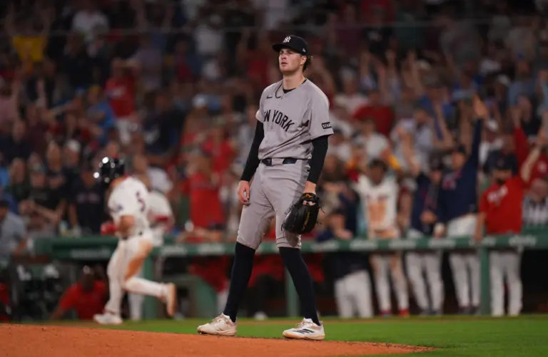 New York Yankees starting pitcher Cam Schlittler looking on after allowing a two-run home run to Boston Red Sox third baseman Caleb Durbin during the fifth inning at Fenway Park in Boston, Massachusetts on June 25, 2026.