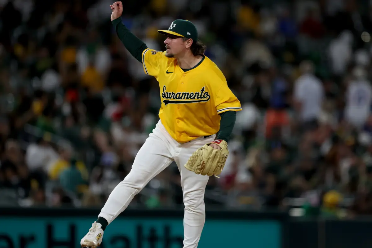Athletics pitcher Mark Leiter Jr. (38) follows through with his pitch against the Washington Nationals during the eighth inning at Sutter Health Park.
