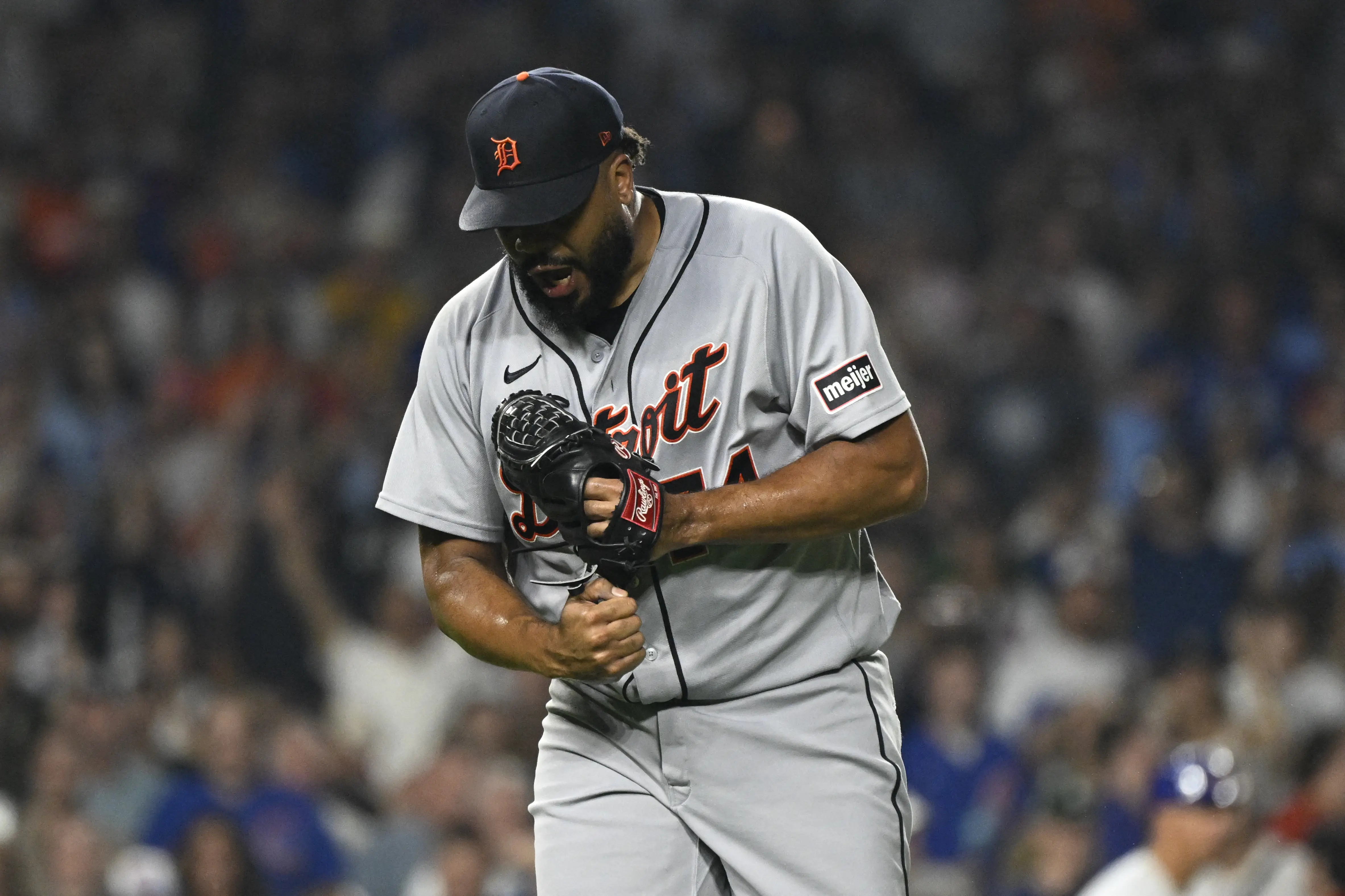 Tigers pitcher Kenley Jansen (74) reacts after closing out the ninth inning against the Chicago Cubs at Wrigley Field.