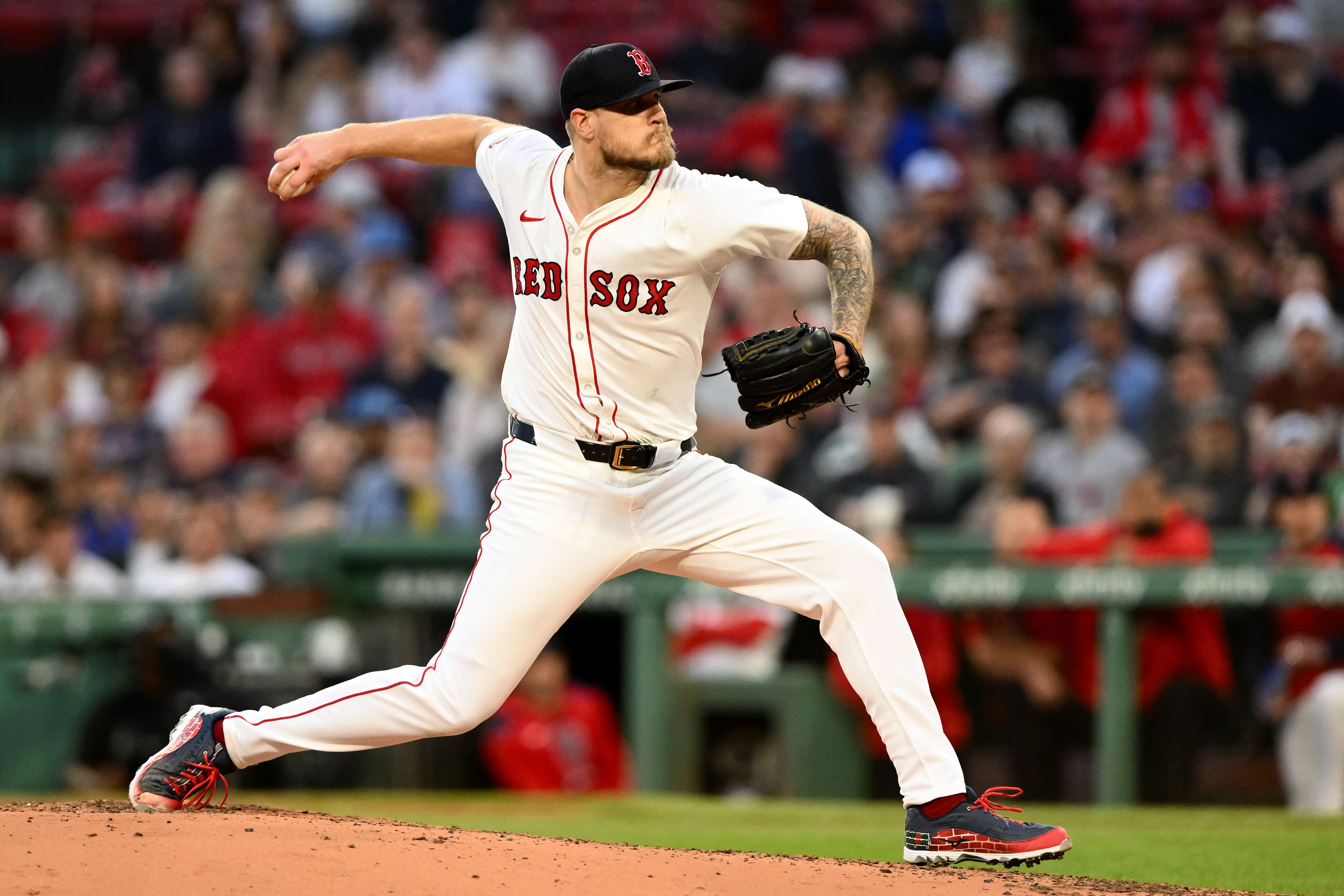 Boston Red Sox starting pitcher Tanner Houck pitching against the Texas Rangers during the third inning at Fenway Park in Boston, Massachusetts on May 7, 2025.