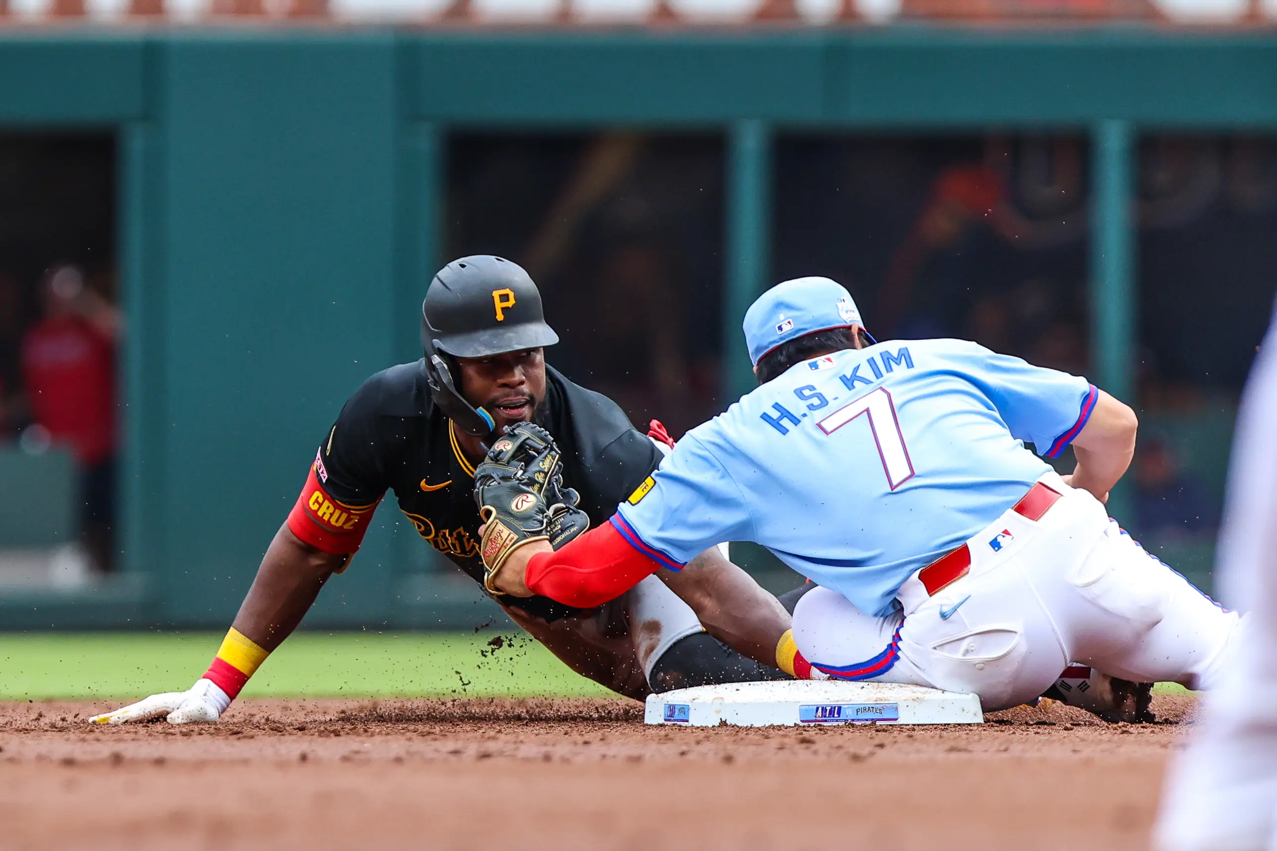 Pittsburgh Pirates center fielder Oneil Cruz stealing second base vs the Atlanta Braves. The Oneil Cruz return from injury should not be rushed by the pirates.