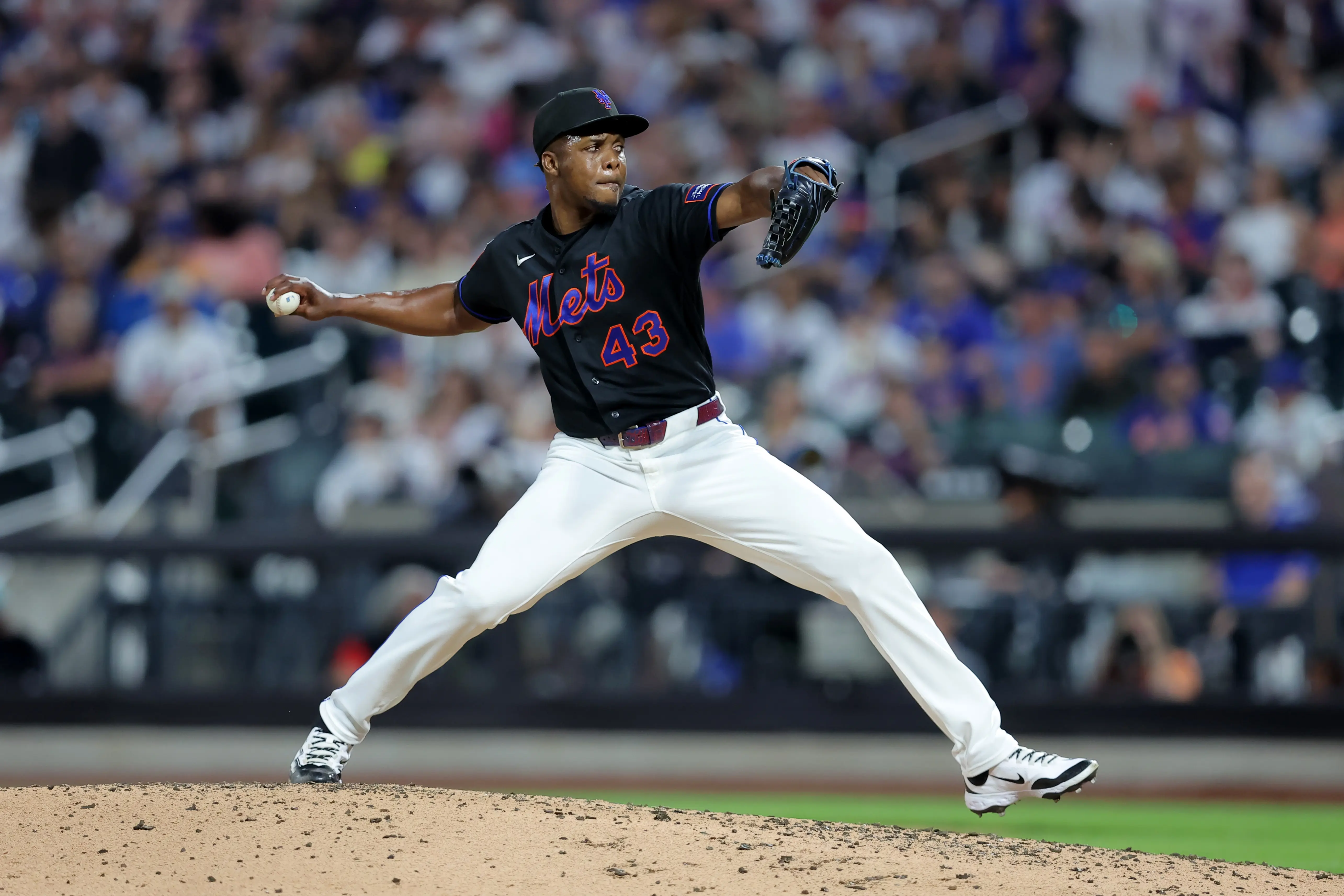 Mets relief pitcher Huascar Brazoban (43) pitches against the Philadelphia Phillies during the seventh inning at Citi Field.