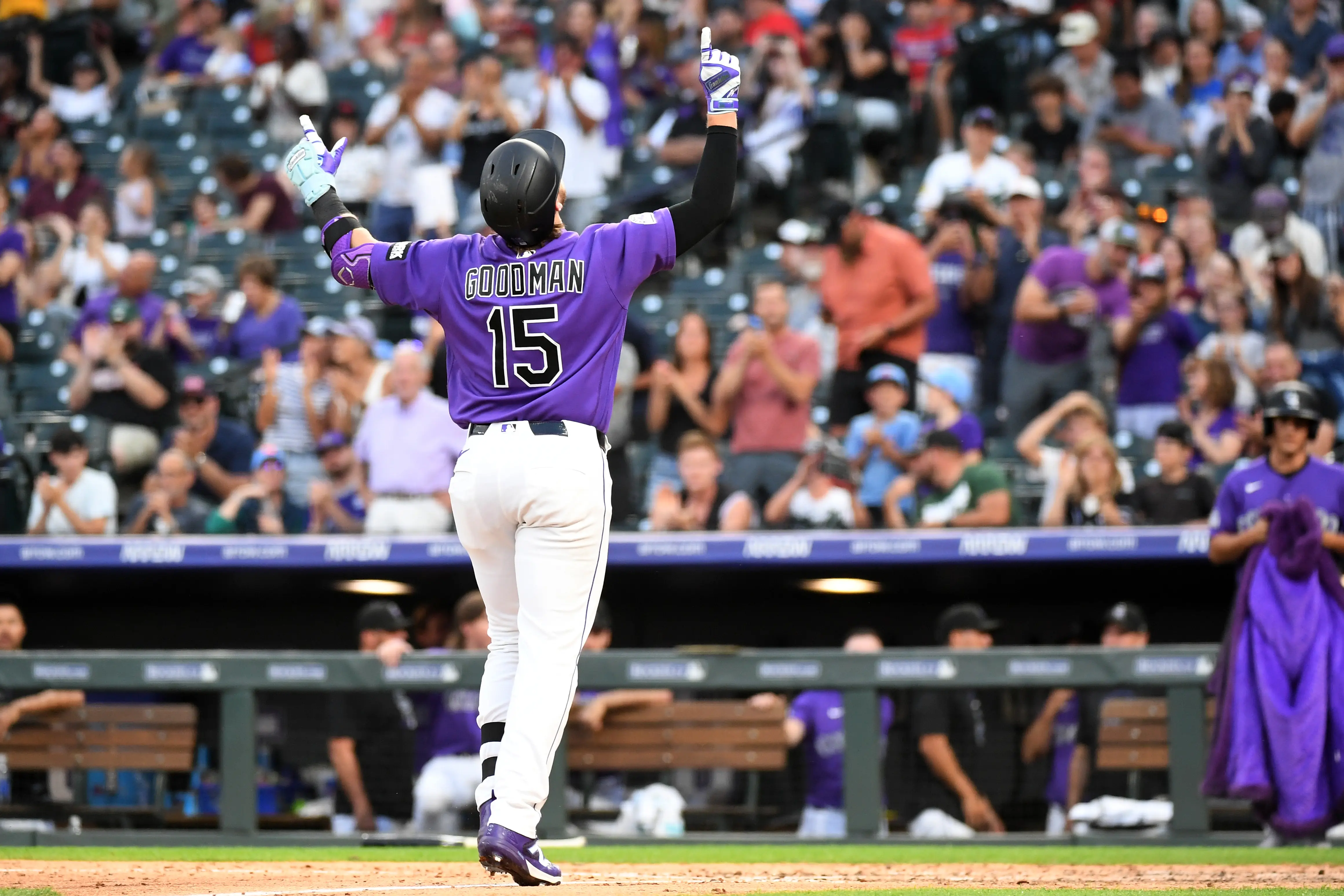Colorado Rockies catcher Hunter Goodman saluting the sky after crossing home plate following a home run he hit in the fifth inning vs the Miami Marlins at Coors Field in Denver, Colorado on July 1, 2026.