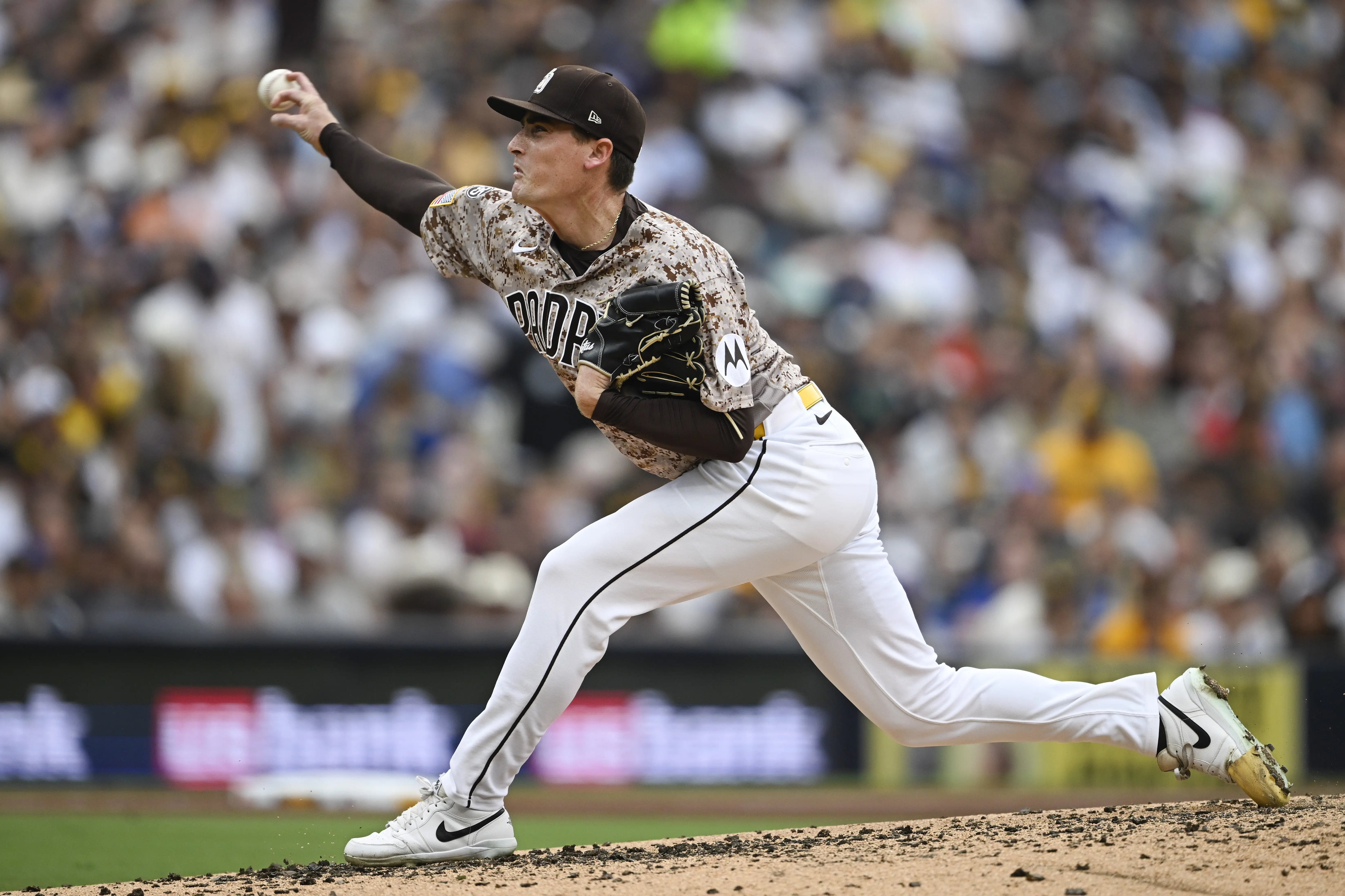 Former San Diego Padres reliever Ron Marinaccio pitching vs the Toronto Blue Jays. The Ron Marinnacio trade was recently executed between the Pittsburgh Pirates and Padres.