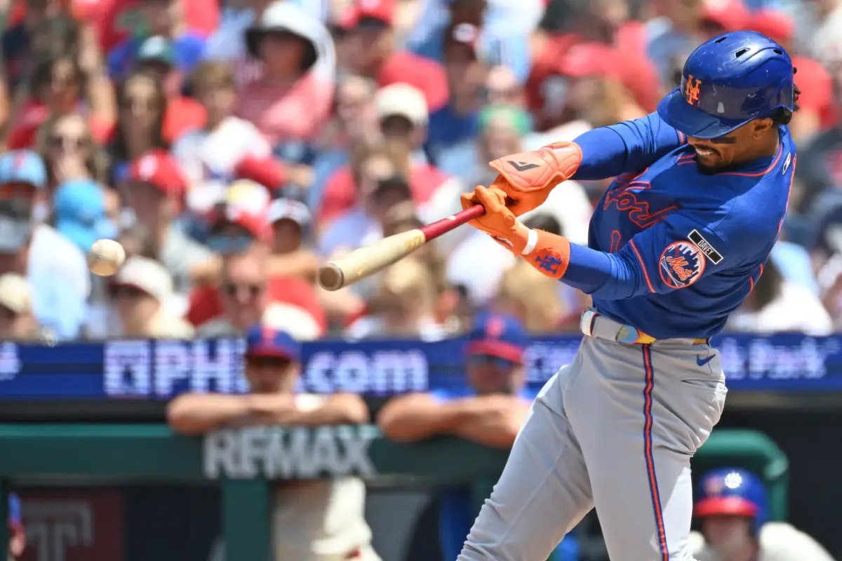 New York Mets shortstop Francisco Lindor hitting an RBI single vs the Philadelphia Phillies.