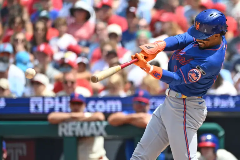 New York Mets shortstop Francisco Lindor hitting an RBI single vs the Philadelphia Phillies.
