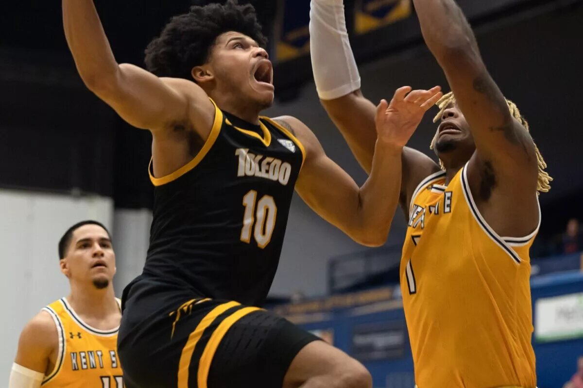 Toledo guard RayJ Dennis goes up for a shot against Kent State forward VonCameron Davis during an NCAA basketball game, Tuesday, Jan. 10, 2023 at the Kent State M.A.C. Center. University Of Toledo Rockets At Kent State Golden Flashes Ncaa Men S Basketball