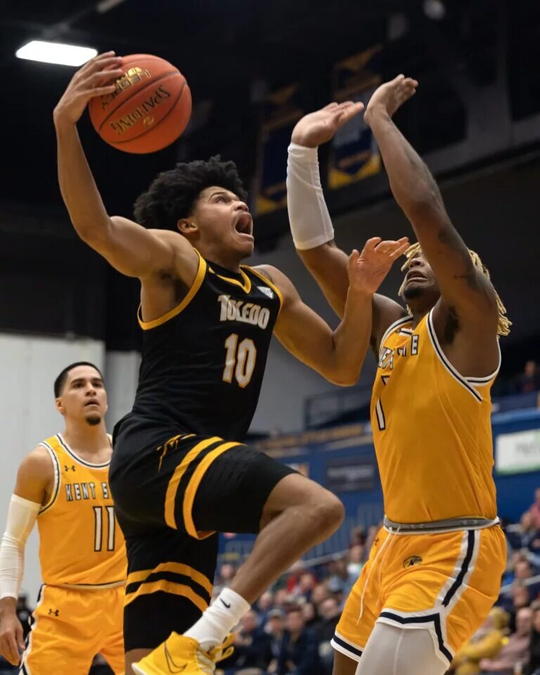 Toledo guard RayJ Dennis goes up for a shot against Kent State forward VonCameron Davis during an NCAA basketball game, Tuesday, Jan. 10, 2023 at the Kent State M.A.C. Center. University Of Toledo Rockets At Kent State Golden Flashes Ncaa Men S Basketball