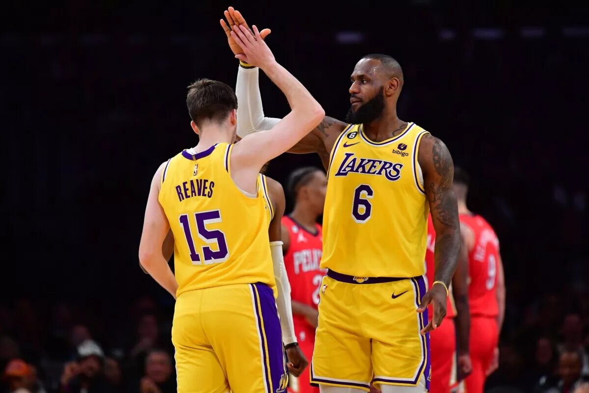 Feb 15, 2023; Los Angeles, California, USA; Los Angeles Lakers forward LeBron James (6) reacts after guard Austin Reaves (15) scores a basket and draws the foul against the New Orleans Pelicans during the second half at Crypto.com Arena. Mandatory Credit: Gary A. Vasquez-USA TODAY Sports