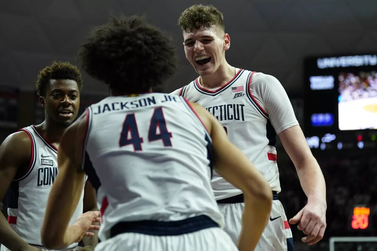Feb 18, 2023; Storrs, Connecticut, USA; UConn Huskies center Donovan Clingan (32) reacts with guard Andre Jackson Jr. (44) after a play against the Seton Hall Pirates in the second half at Harry A. Gampel Pavilion. Mandatory Credit: David Butler II-USA TODAY Sports